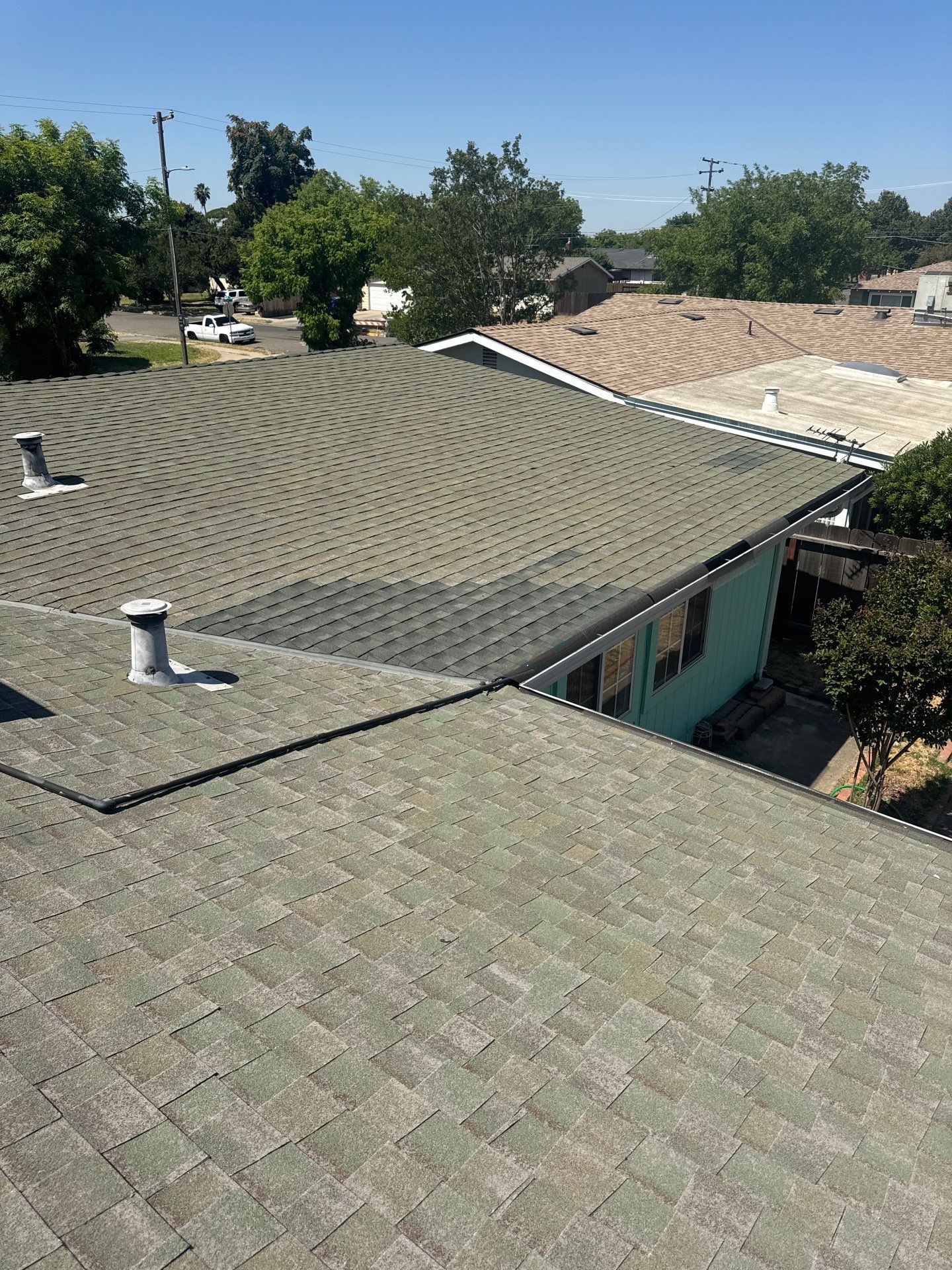 Osborn Terrace Atwater  by Econo Roofing
