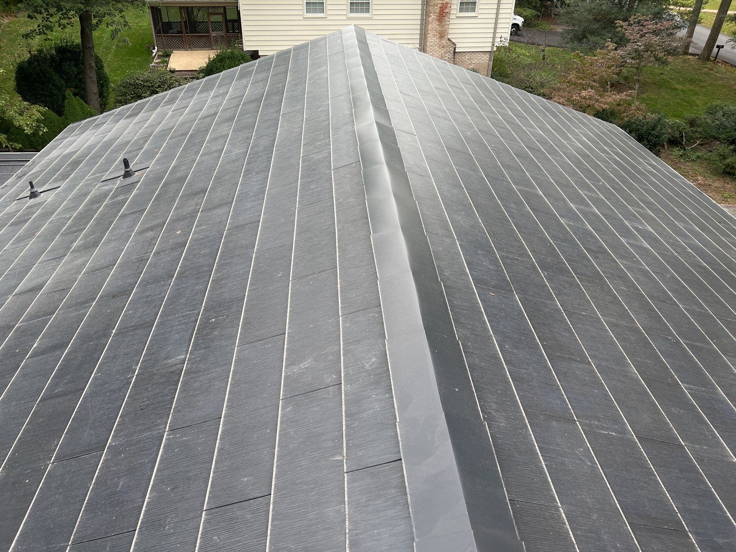 Tesla Solar Roof Replacement using Tesla Solar Roof V3 Tiles by American Home Contractors