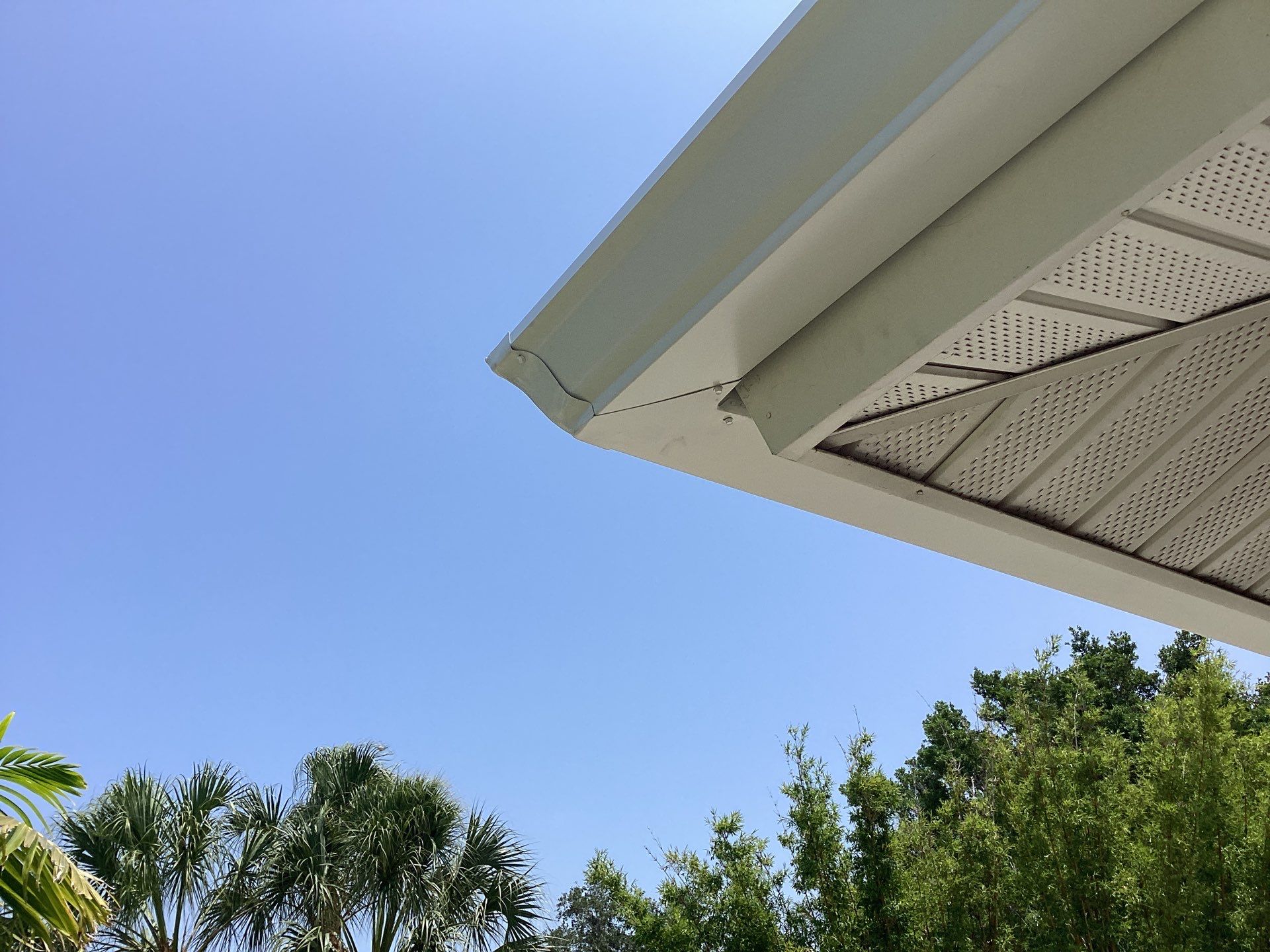 White Seamless Gutters and Downspouts in Sarasota FL by Gutter Professors