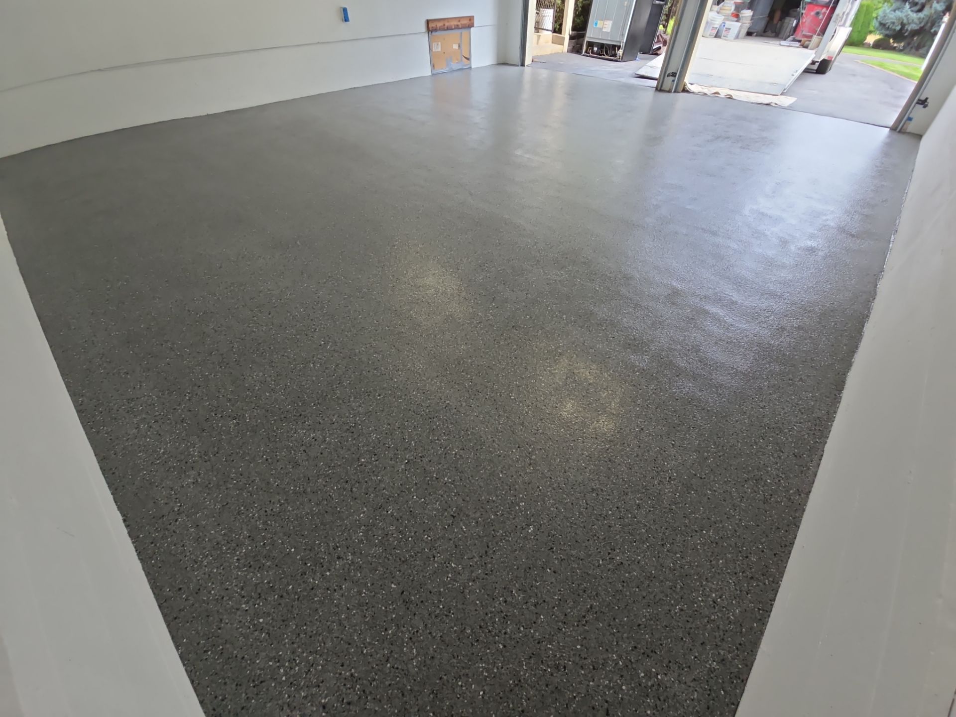 Garage Transformation using Slate Hybrid by Croc Coatings, LLC