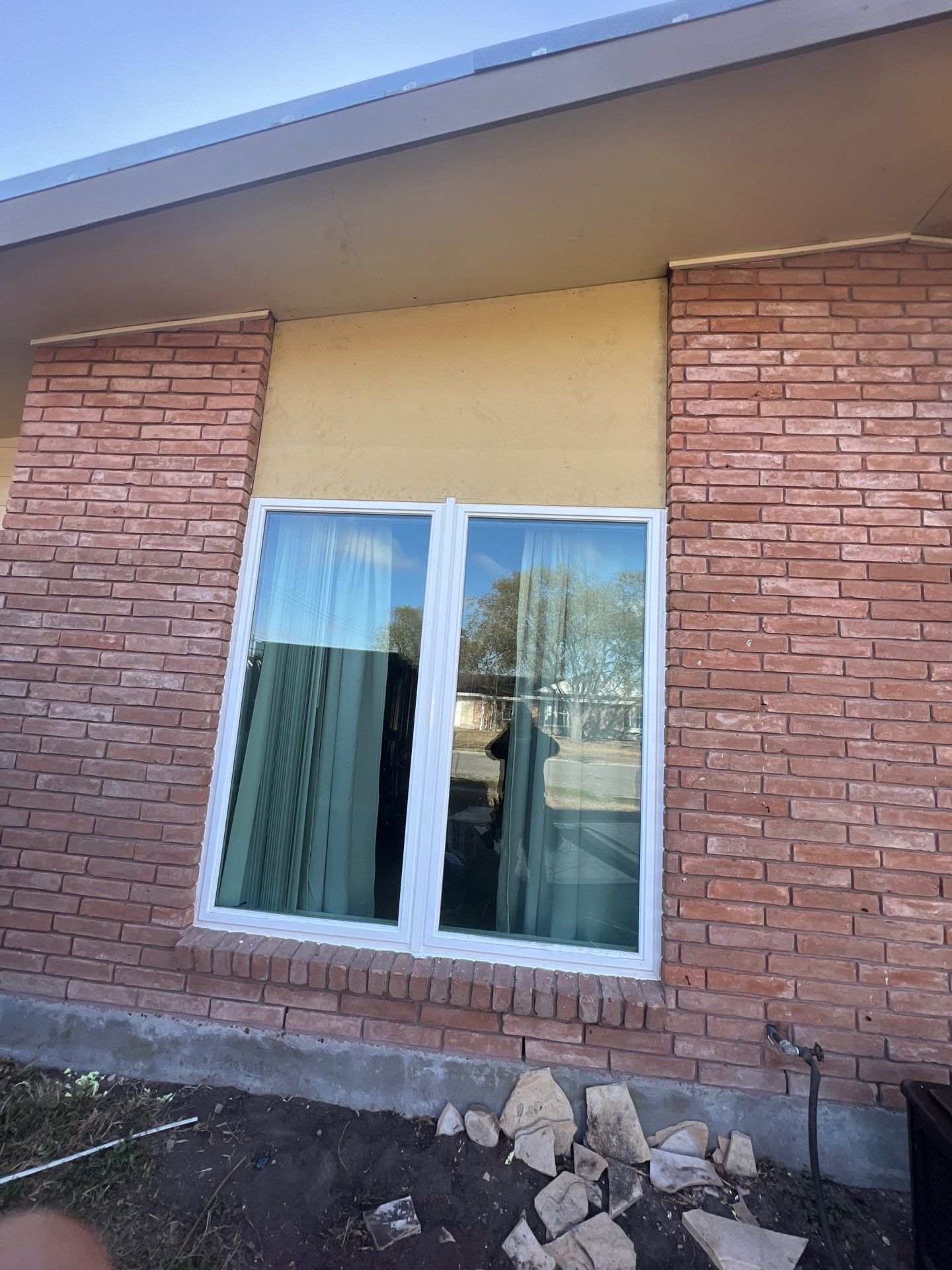 Windows in Brick with a Bay Window by Bayfront Roofing and Construction