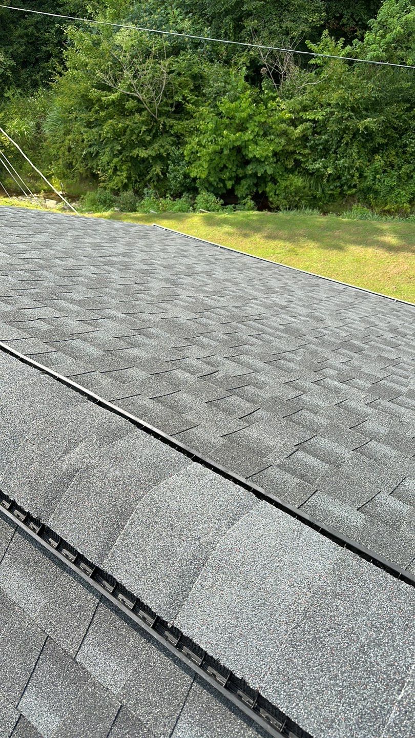 Residential Roofing Installation using Performance Shingles by Mr. Roofer