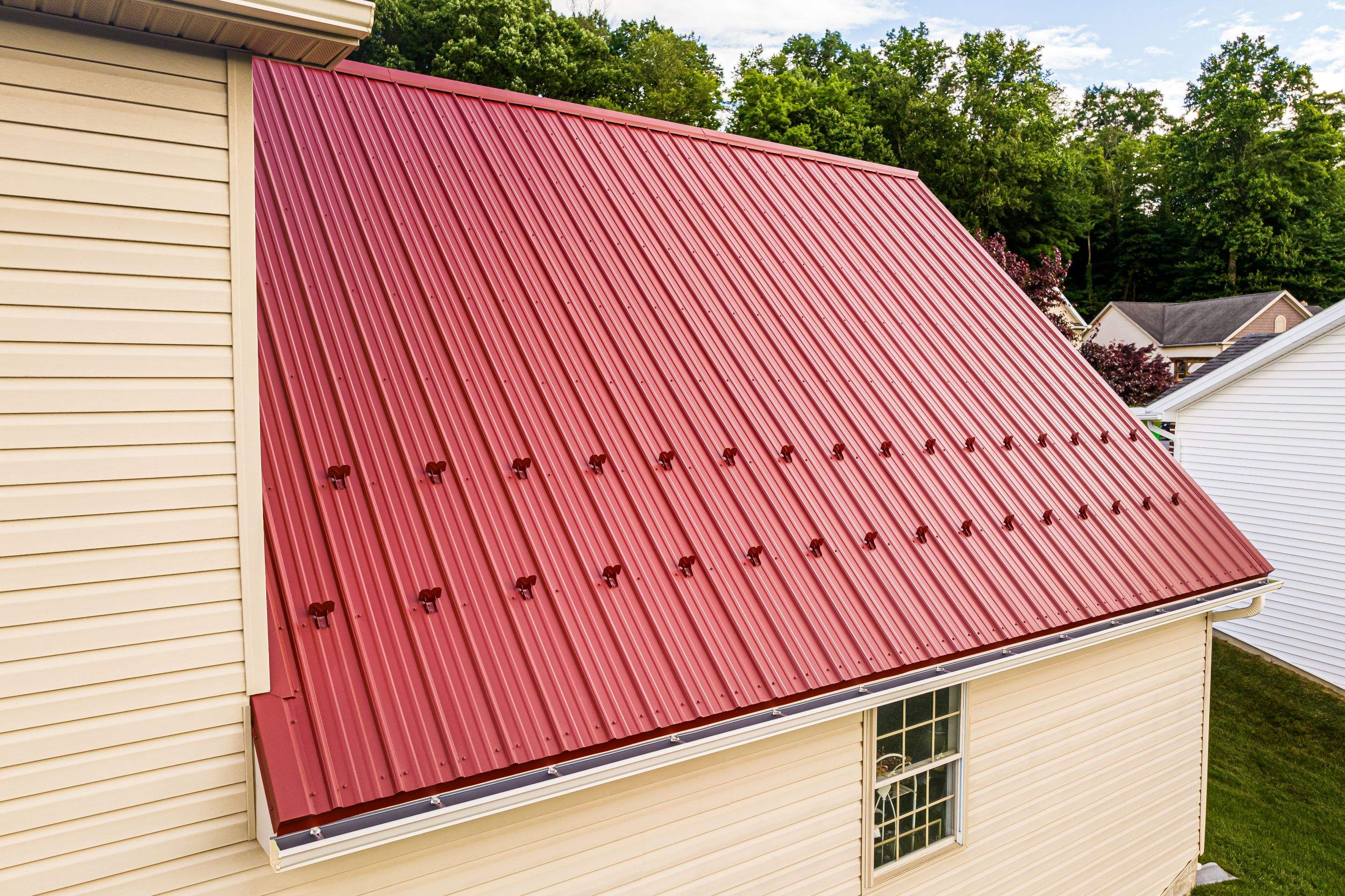 Metal roof-colonial red by Esh Builders