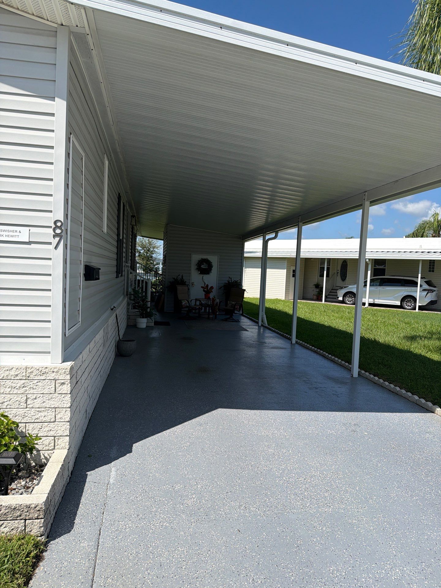Driveway Transformation with Gravel Grey Flake Epoxy Coating