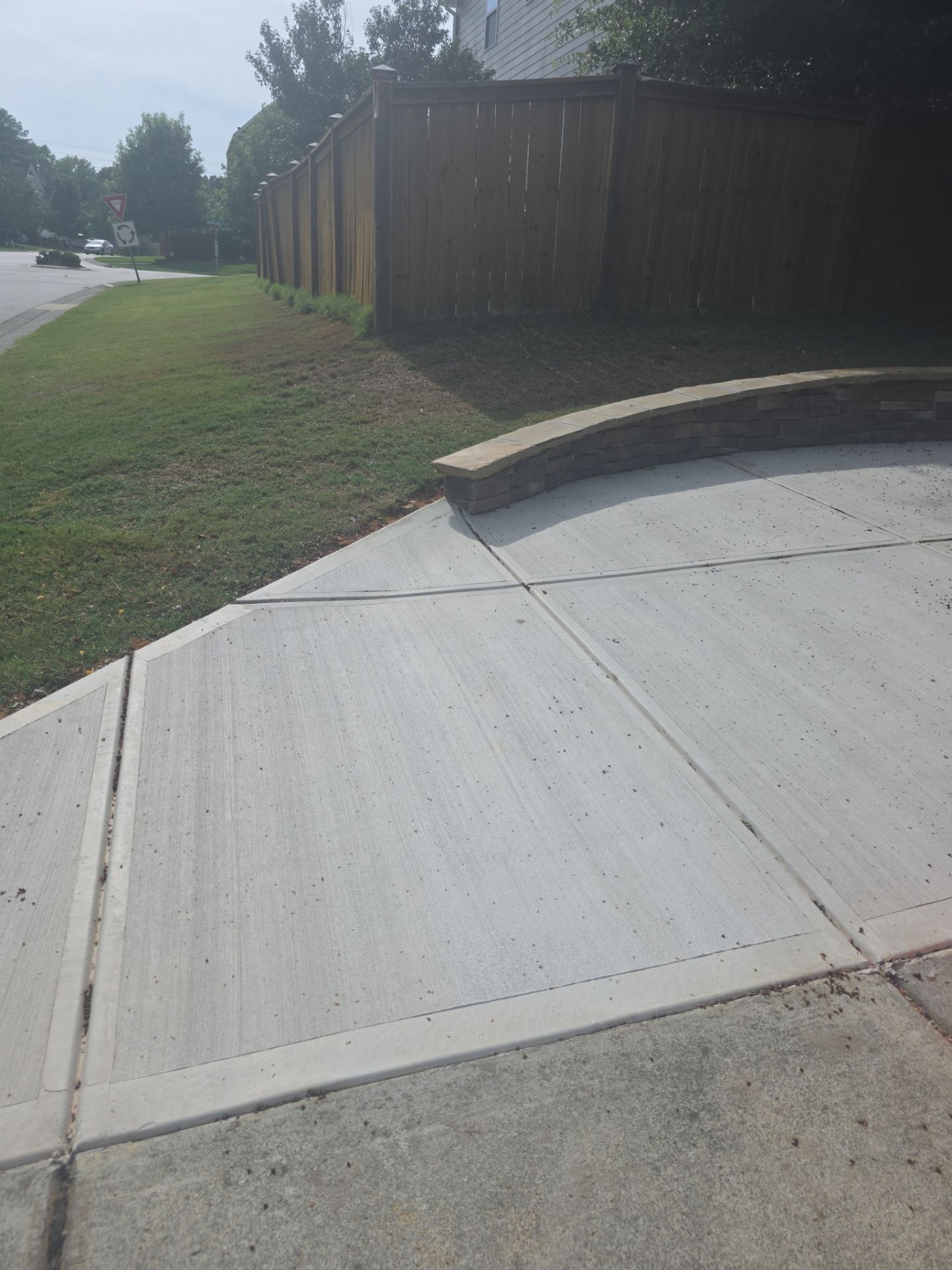 Concrete Driveway Expansion & Retaining Wall | Apex, NC by Elite Remodeling and Design LLC