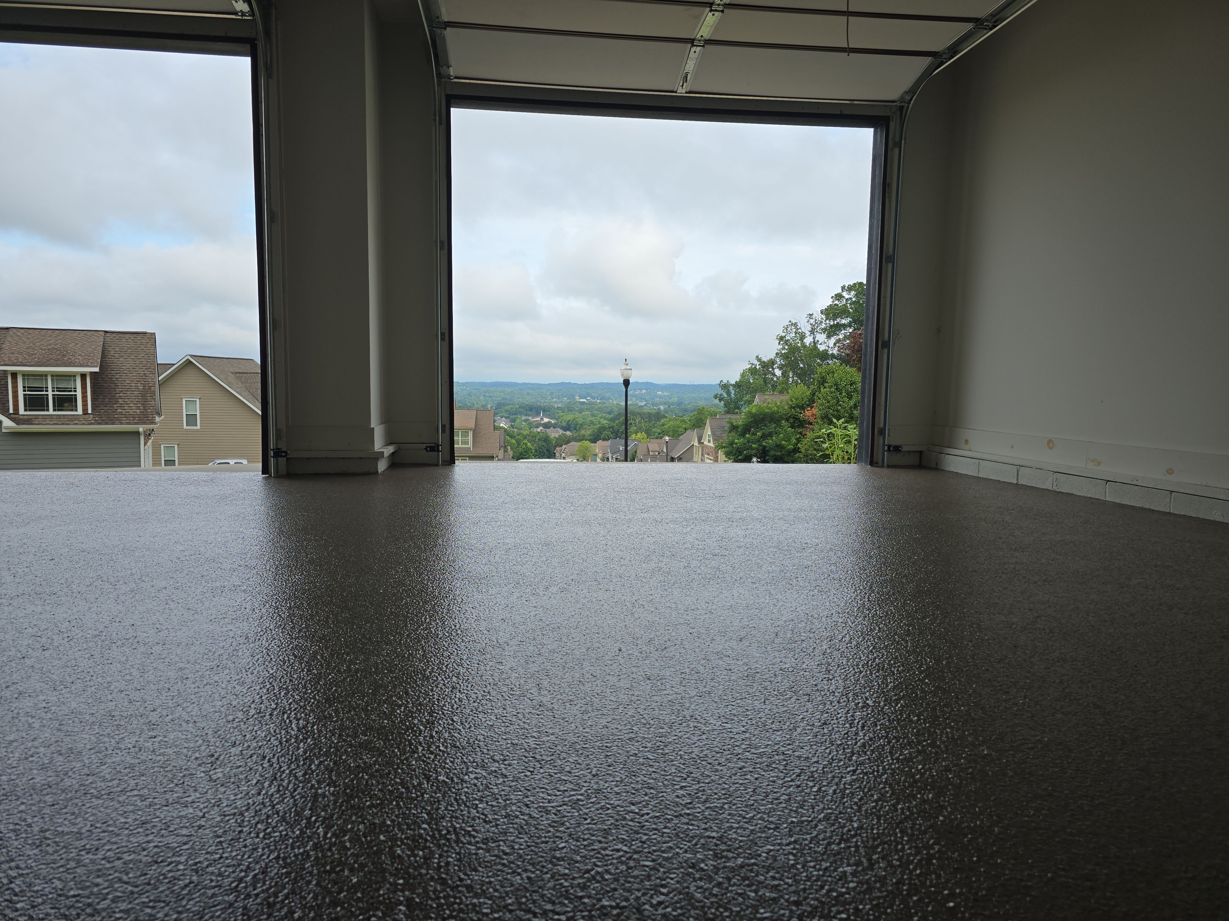 Front Porch and Garage using Obsidian by Elite Floor Solutions