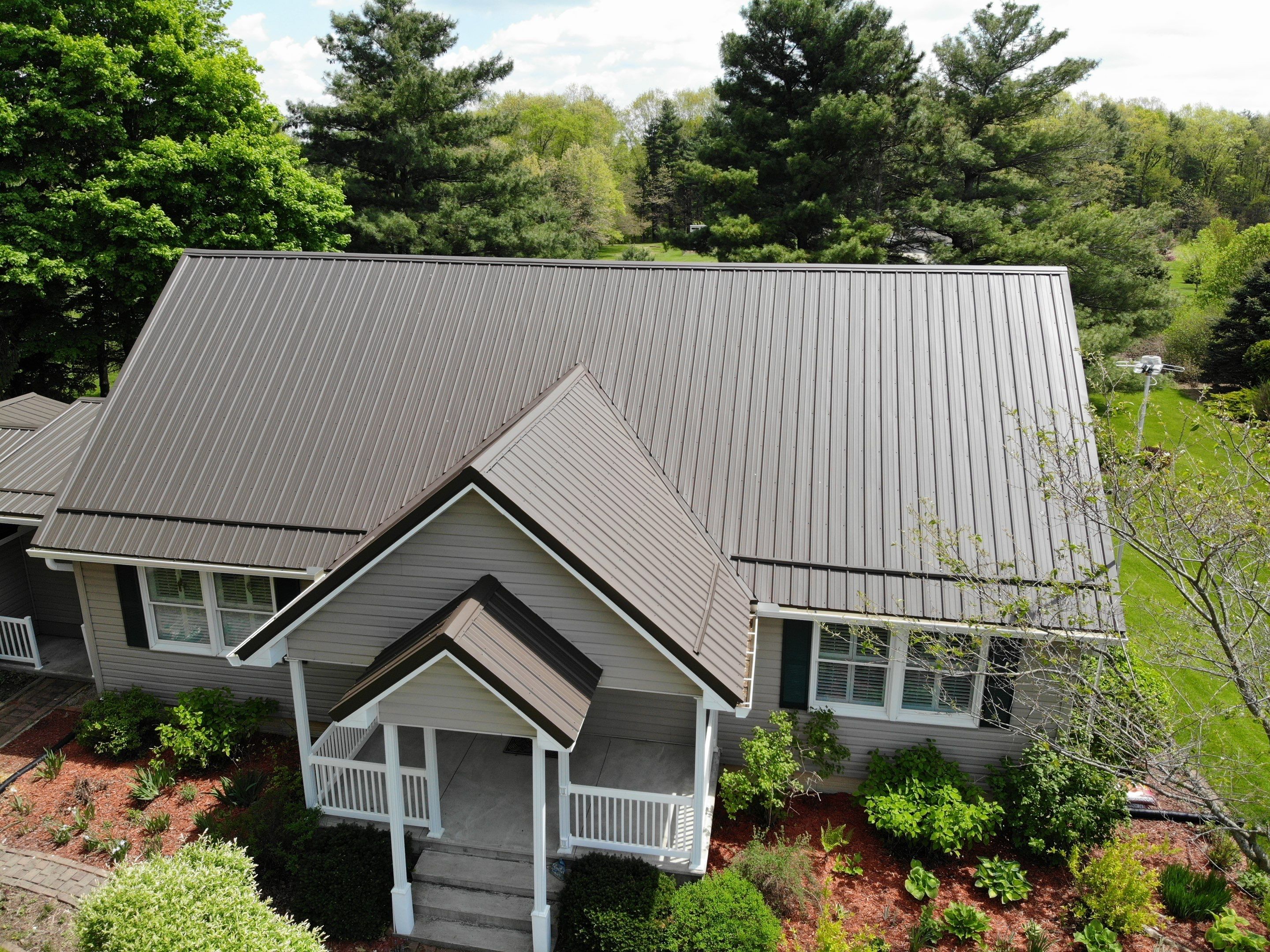 Burnished Slate Exposed Fastener Metal Roof That Withstood a Tornado in Ligonier, Indiana by 4Ever Metal Roofing