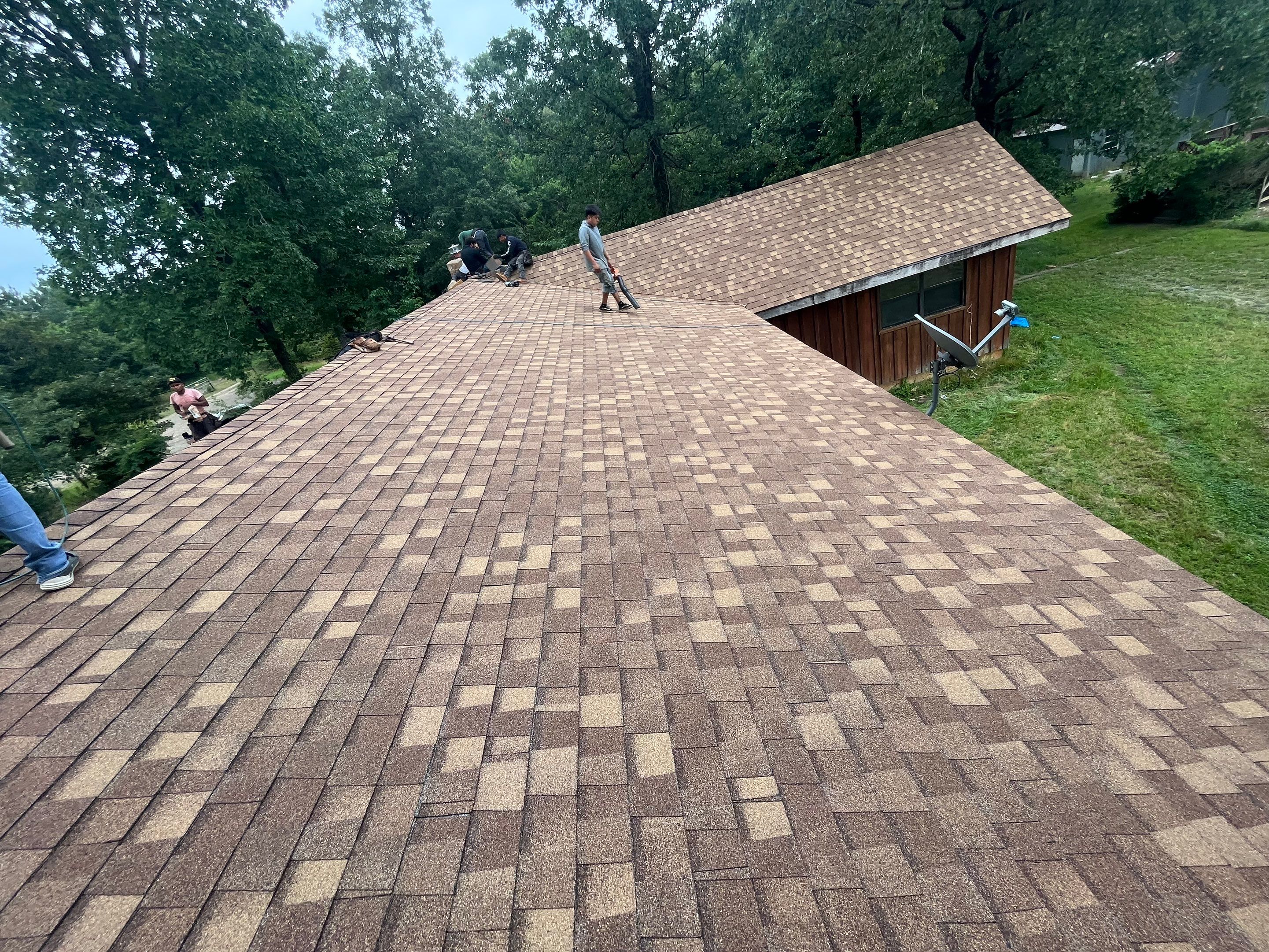 Storm Restoration Reroof: 25 Year 3-Tab Shingle by Hostetler Roofing