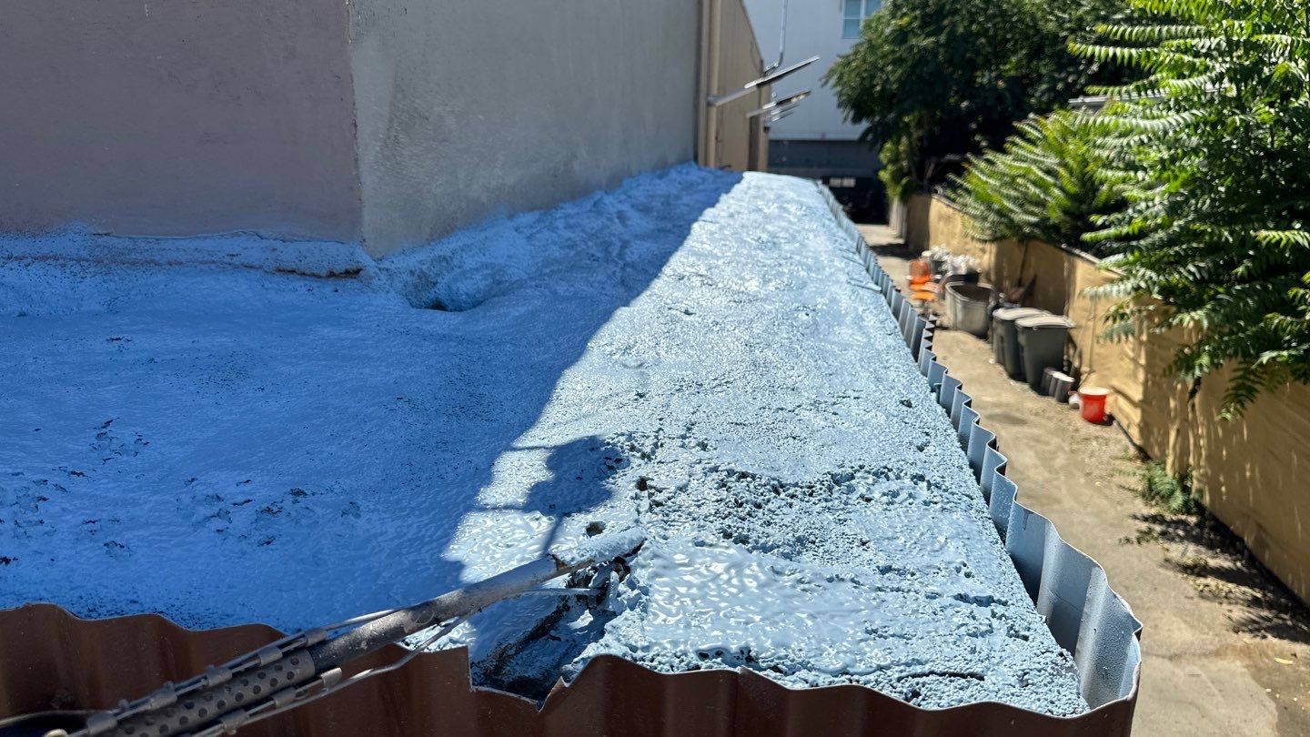 Foam Refurbish using Conklin Benchmark/PUMA XL coatings and spray foam by Straight Edge Roofing Inc