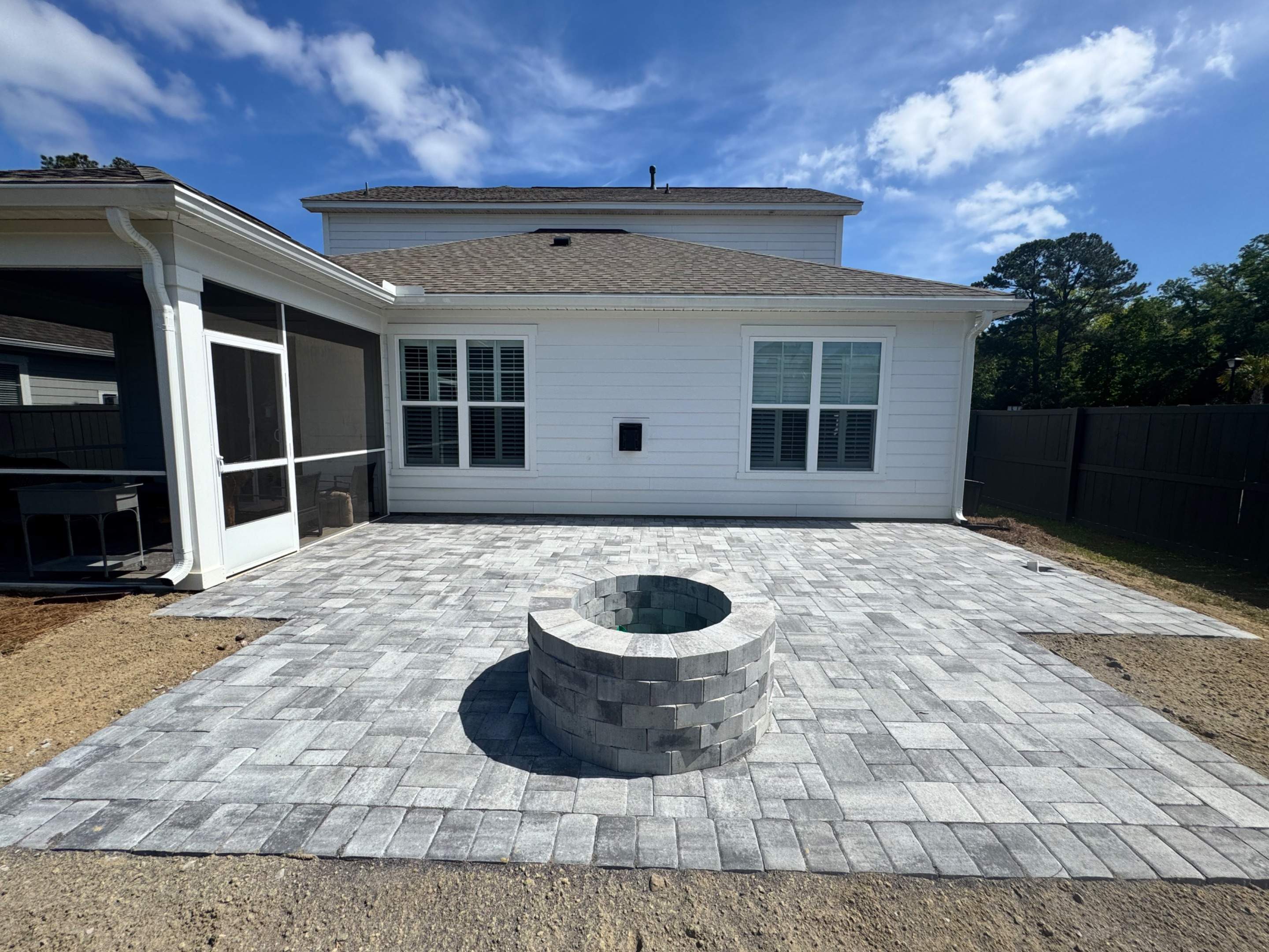 Custom Paver Patio and Stone Fire Pit Installation in Mt Pleasant by Lowcountry Scapes, LLC