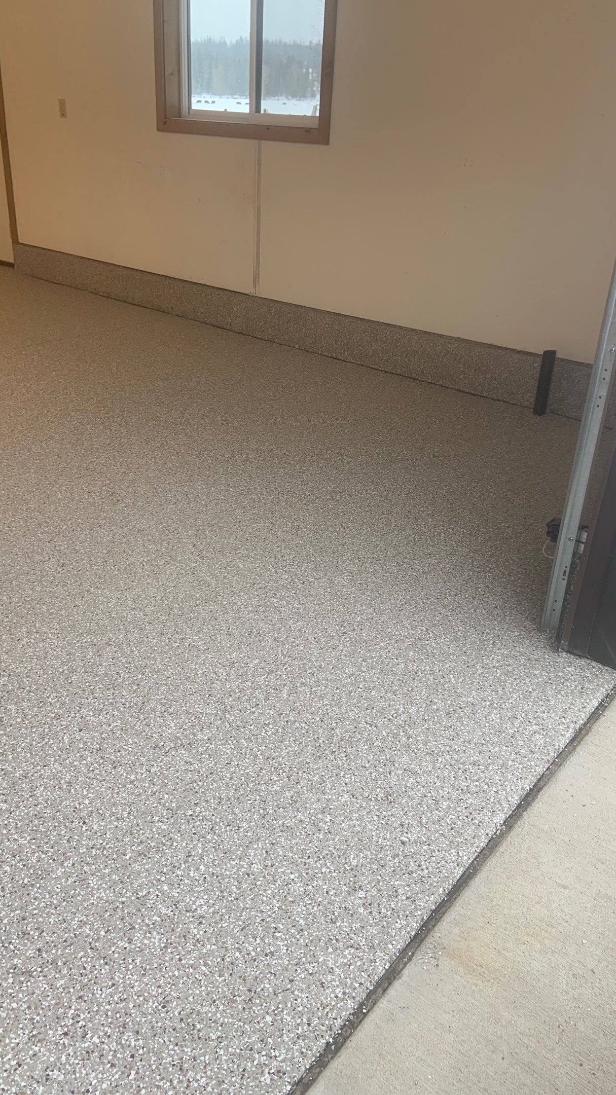 Garage Transformation using Pebble Beach by Croc Coatings, LLC