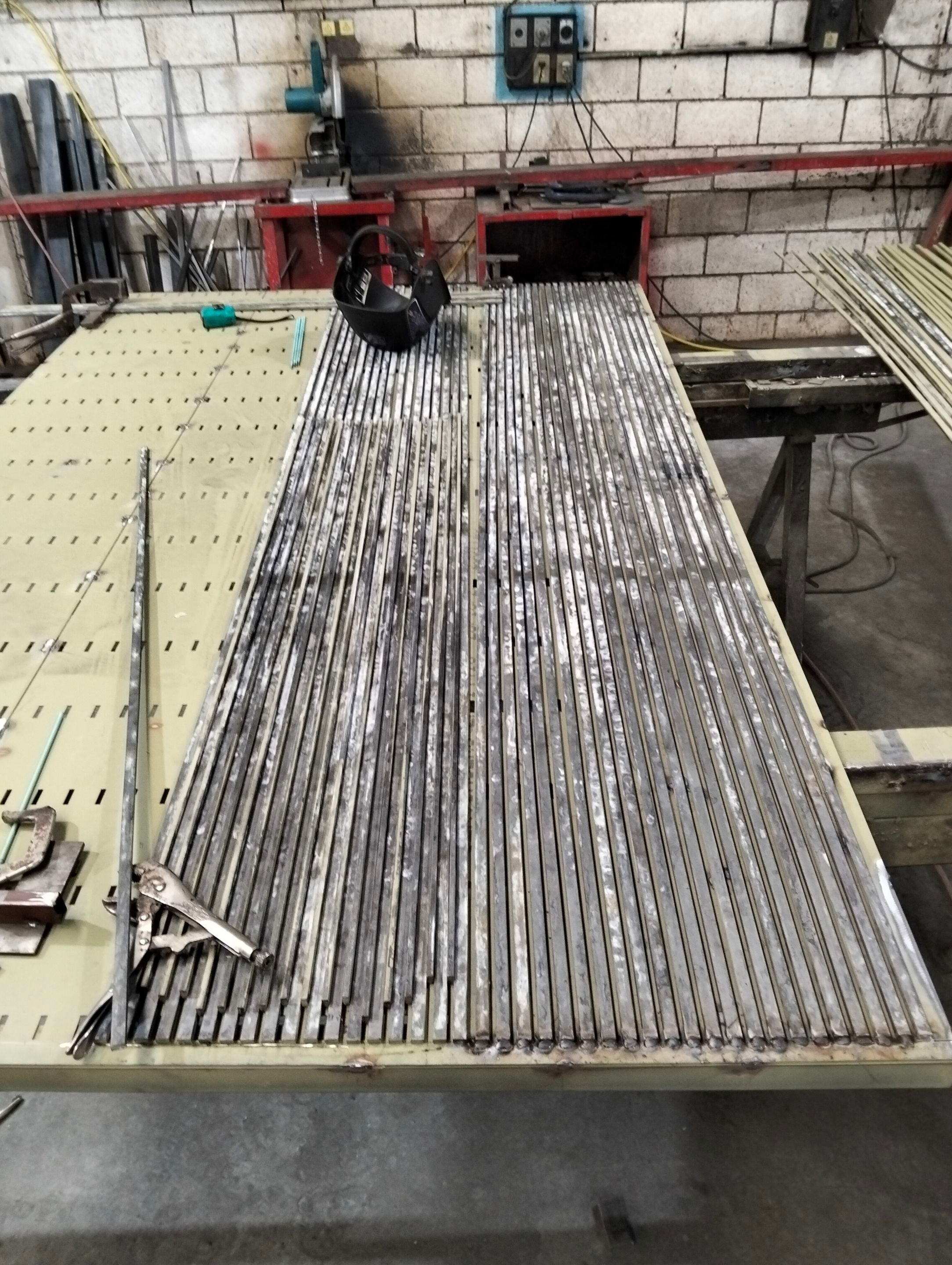 Custom Steel Oporto Pivot Door Installation for Dallas New Construction by Solara Custom Living