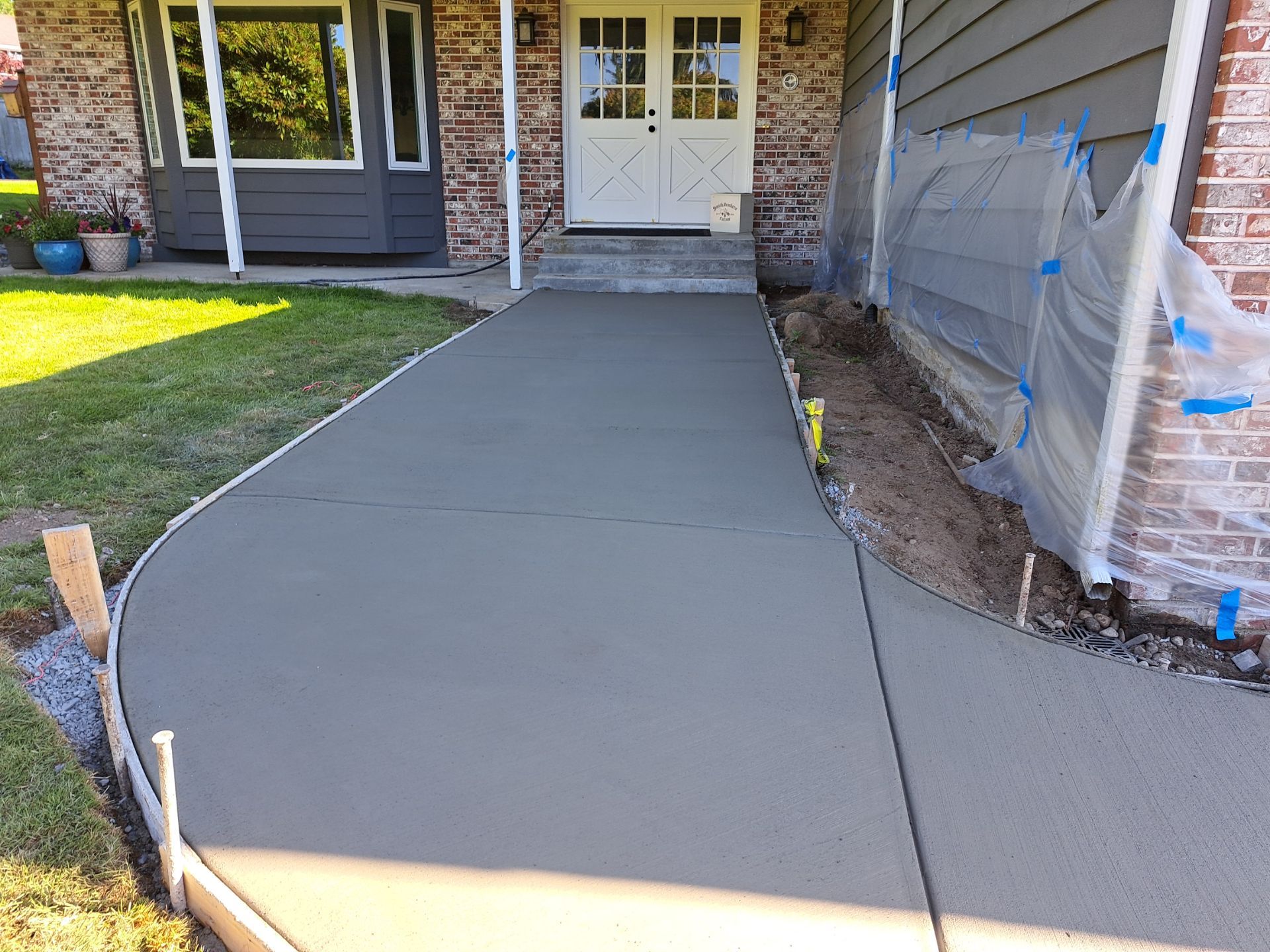 Jacob | Concrete Driveway  by Jireh Asphalt & Concrete Inc 