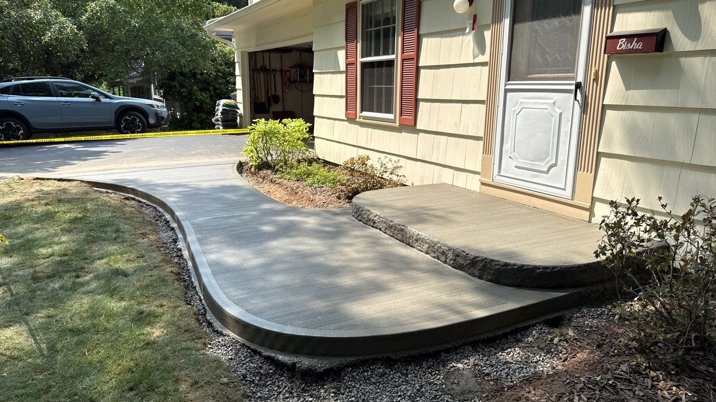 Broom Finish Walkway  by NG Masonry & Construction LLC