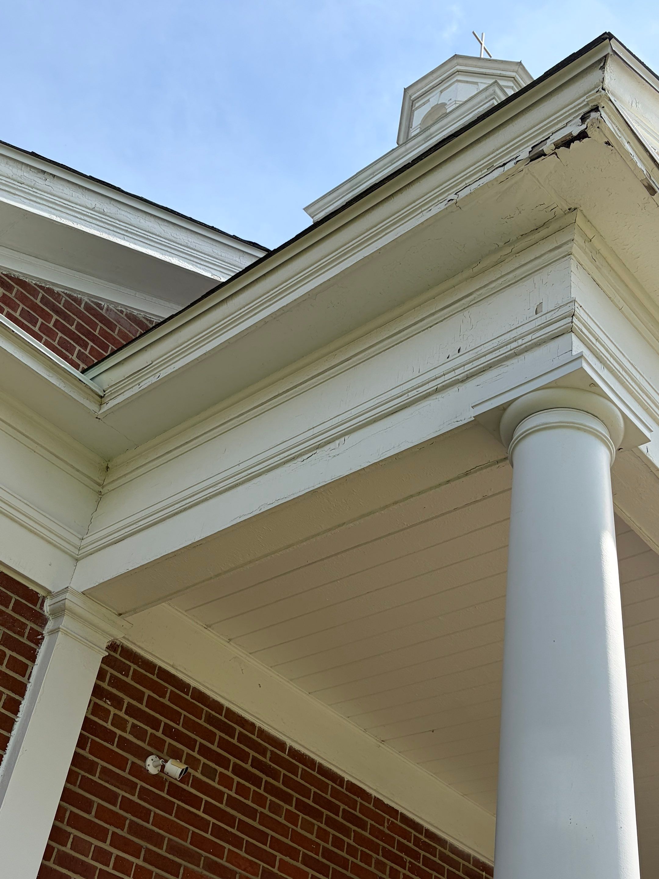 Commercial Wood Trim Restoration and Gutter Replacement in Birmingham by Top Shelf Painter