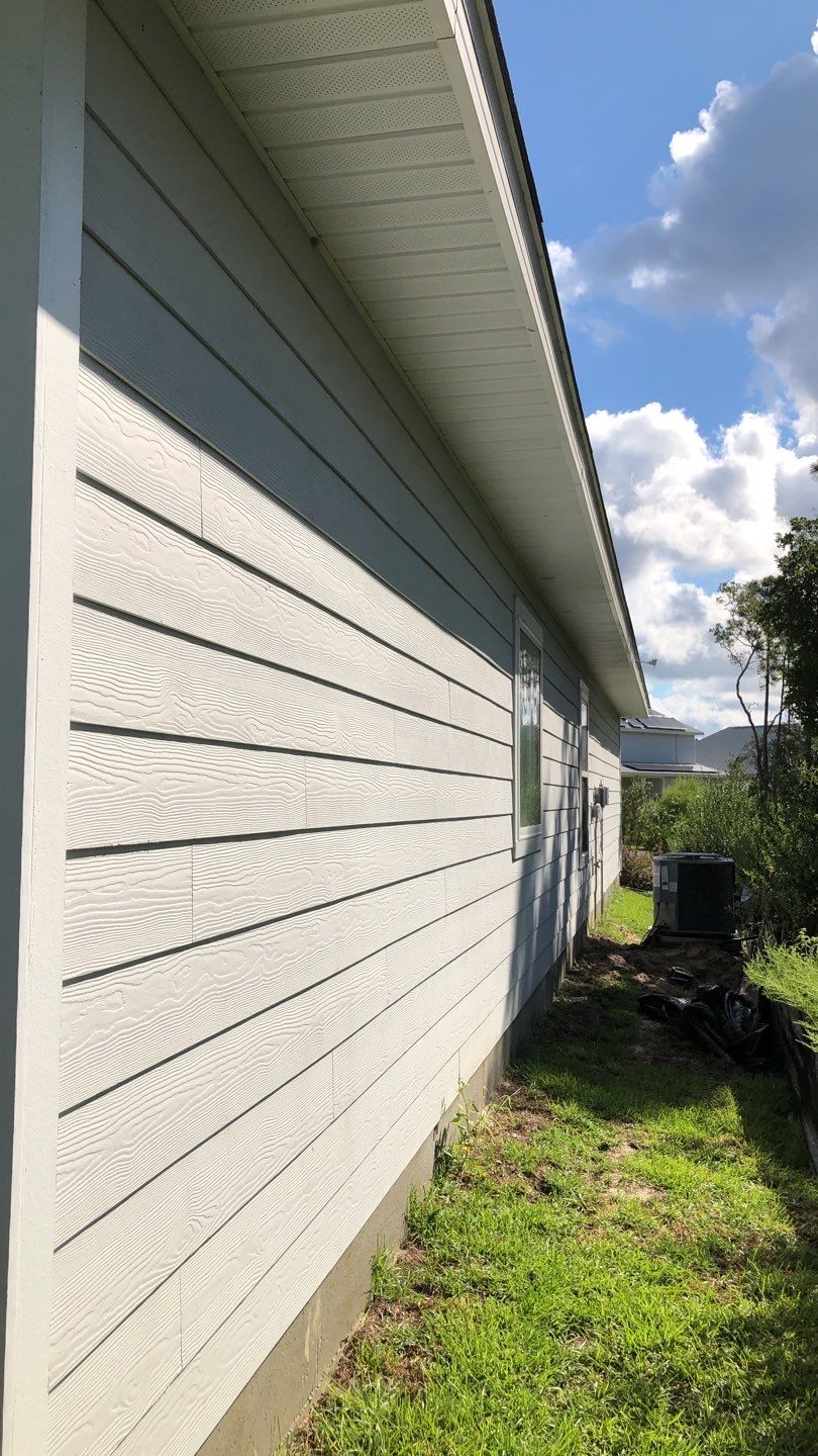 Seamless Gutter Installation using White by Gutter Professors