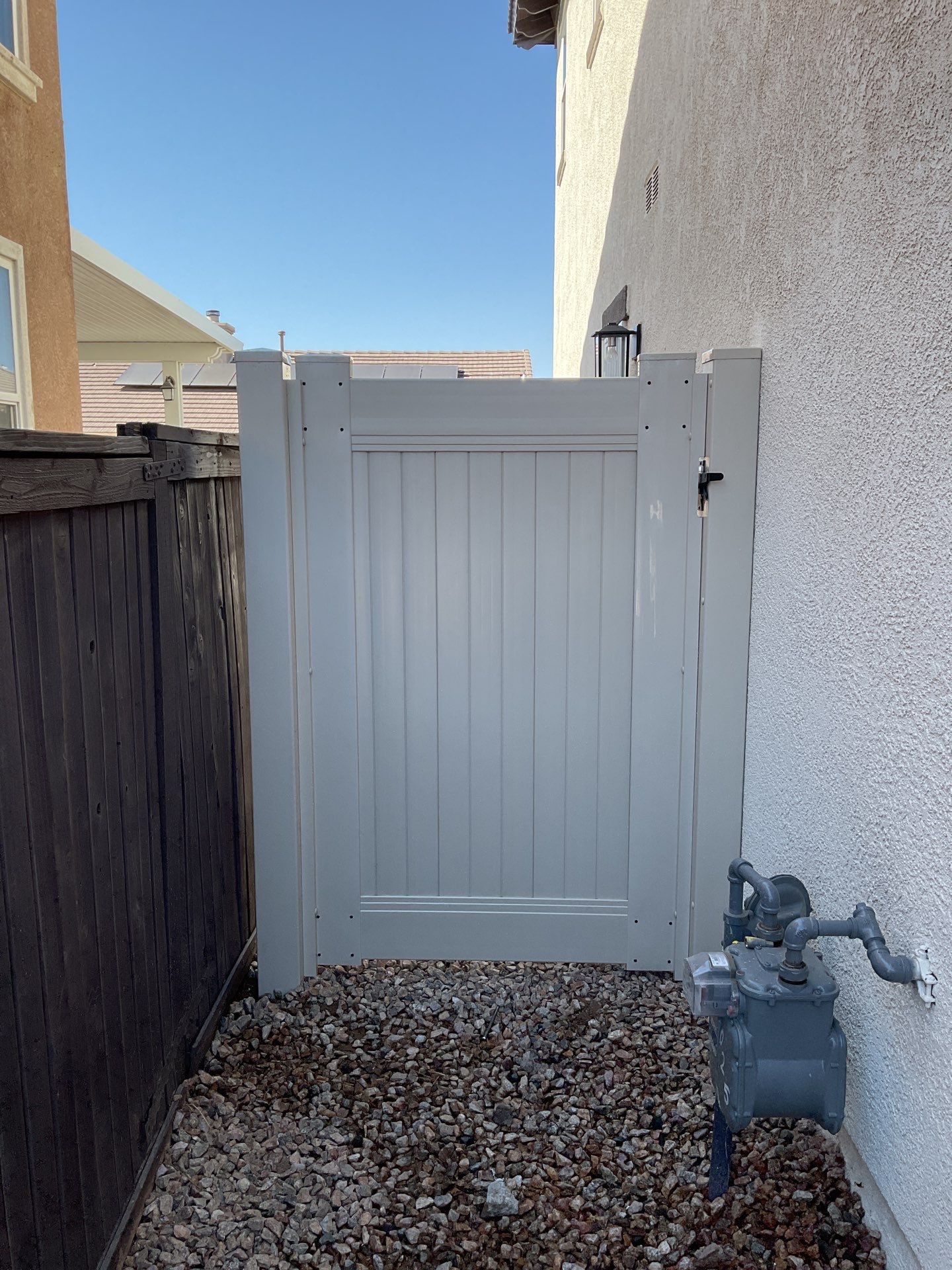 Gate installation using Vinyl by Fence Guys Inc.