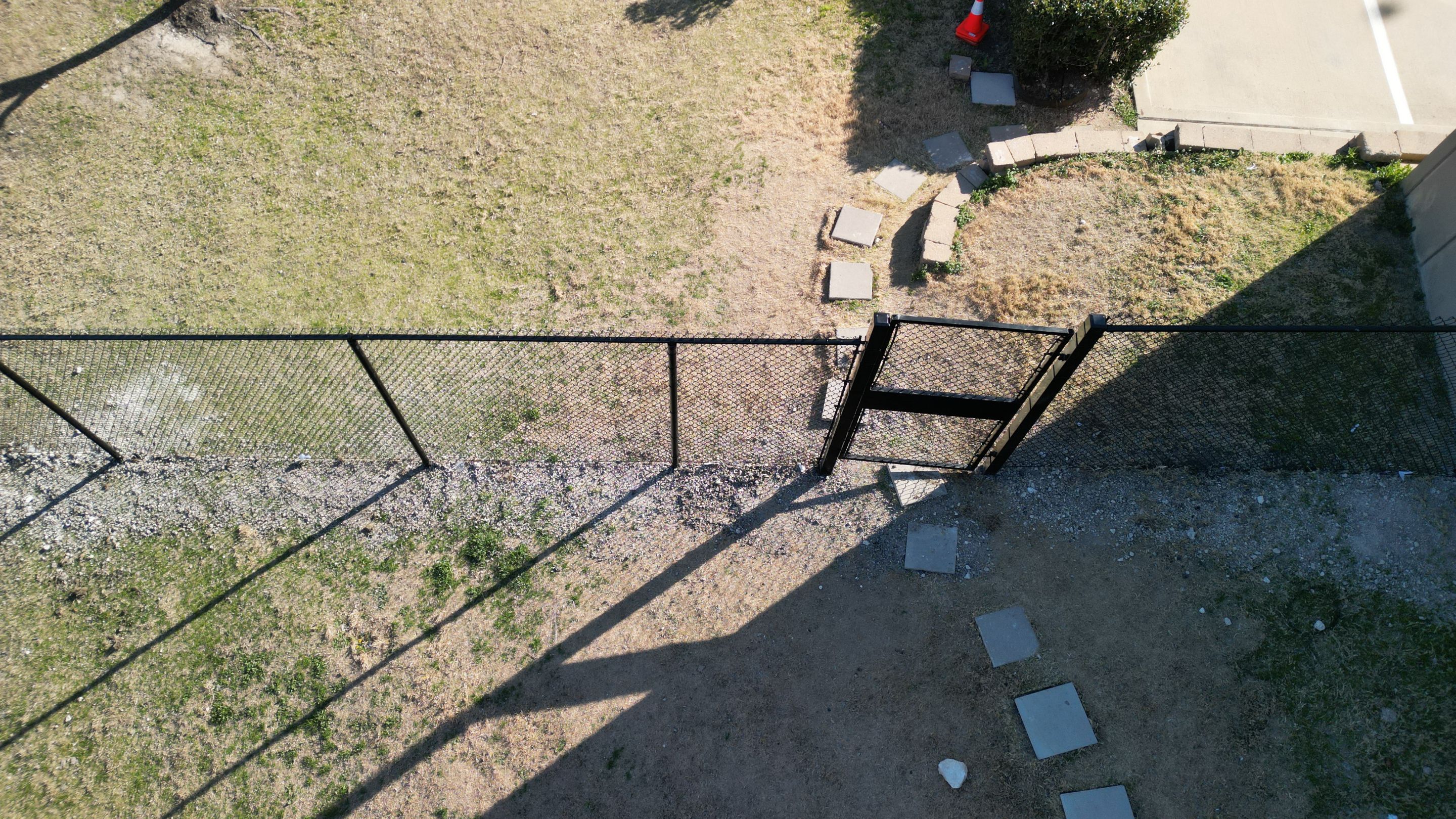 Commercial Fencing - Black vinyl coated Chain link Fence by 3:16 Roofing and Construction