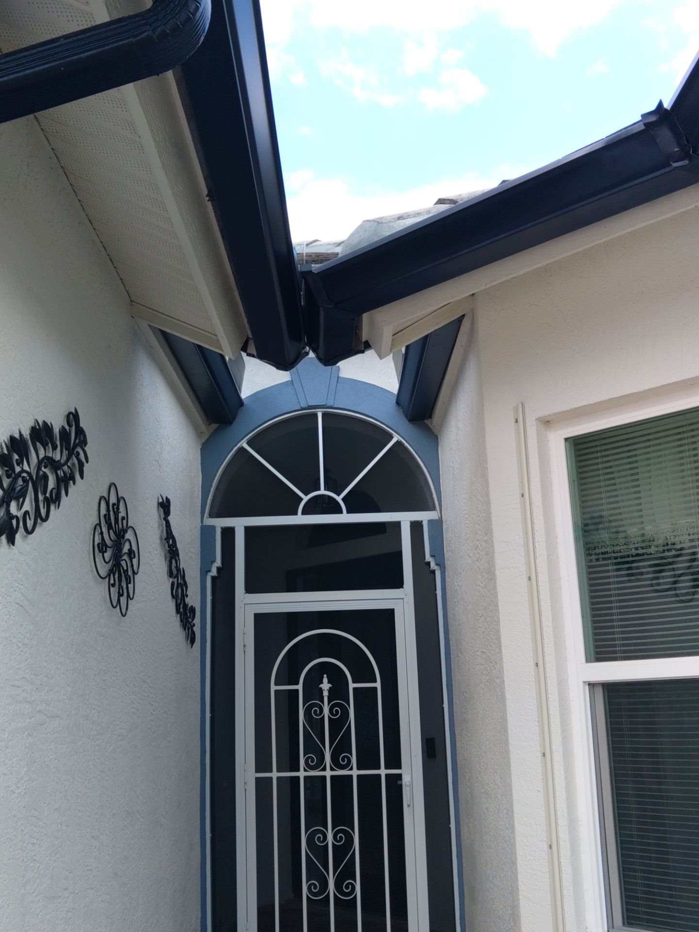 Black Seamless Gutters  by Gutter Professors