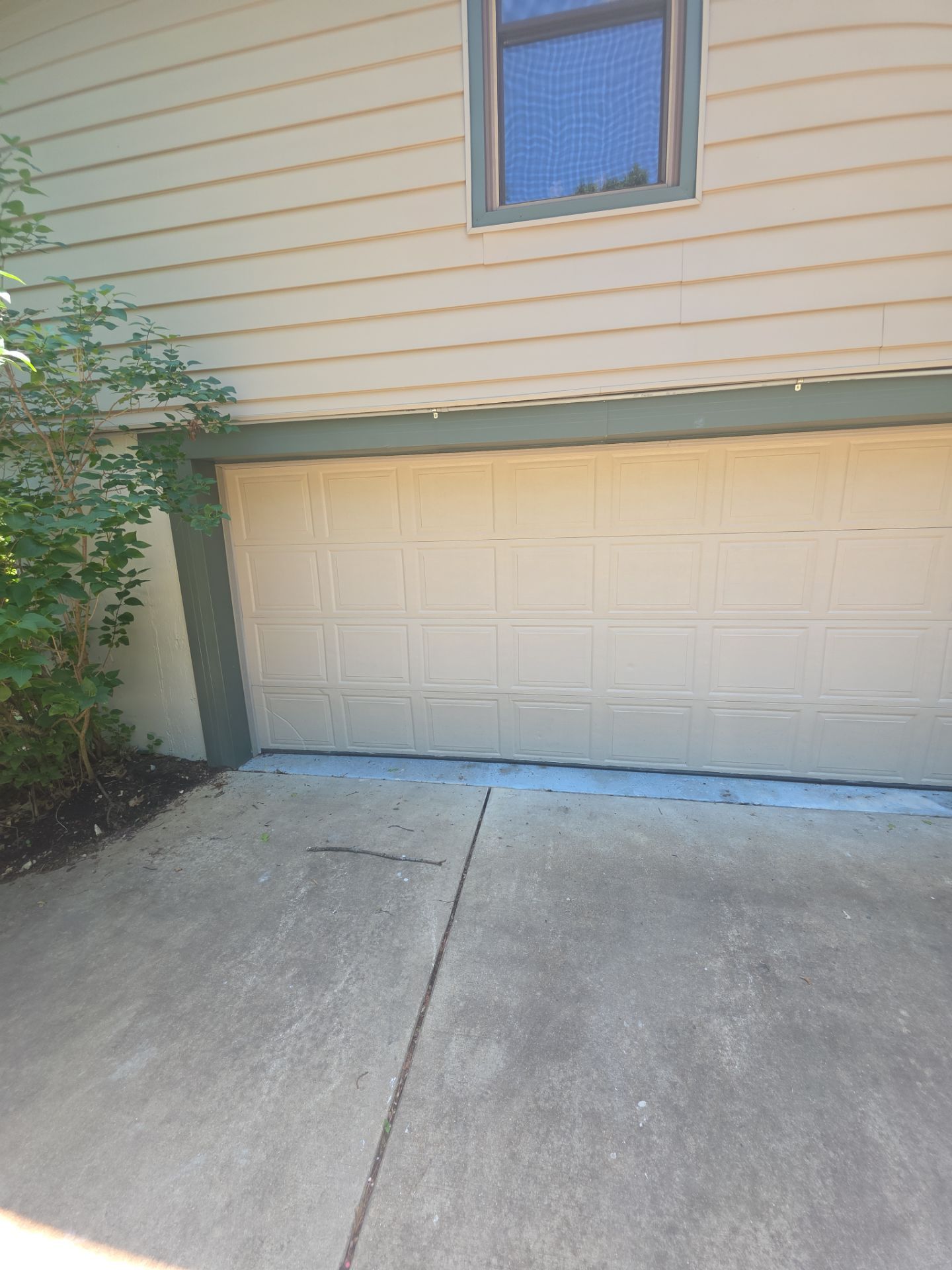 Exterior Entry Door and Garage Door Painting by Legendary Services Company LLC.