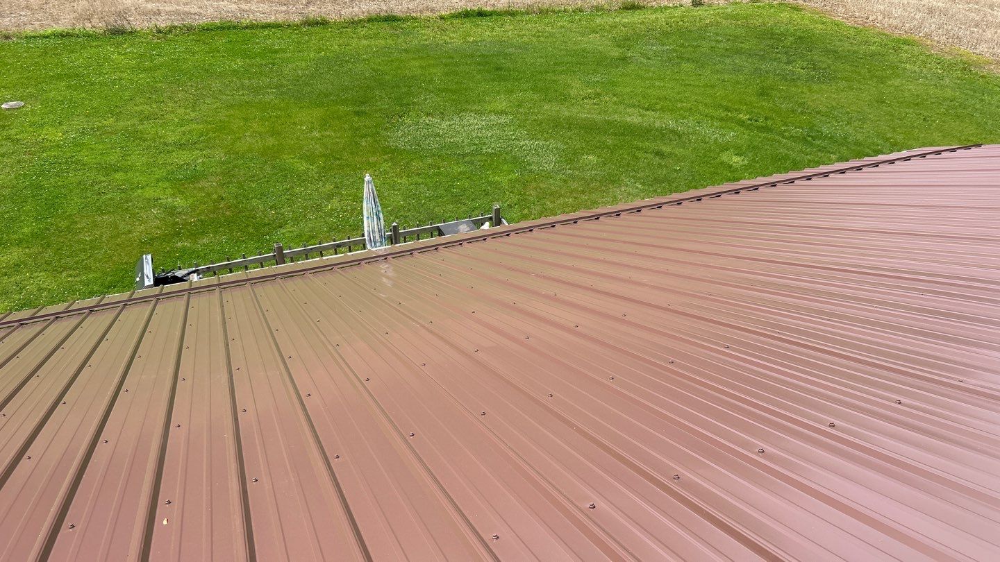 Residential Roofing Installation using Performance Panel Metal - Coca Brown by RoofX 