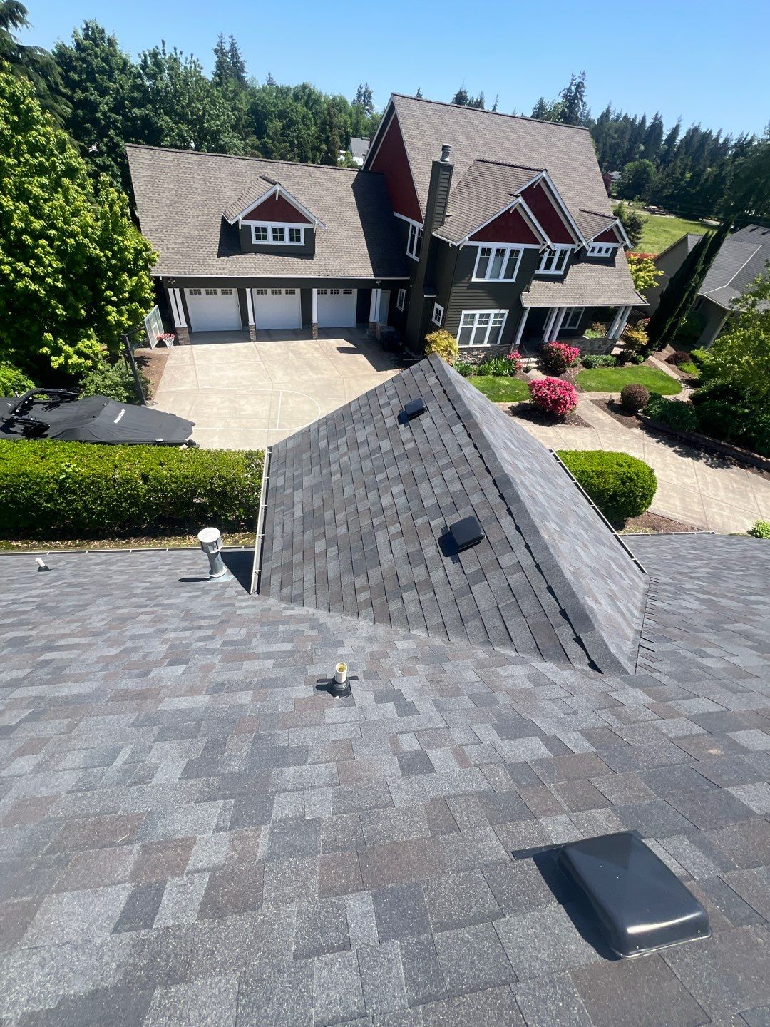 Residential Roofing Installation using Malarkey Vista (Color: Black Oak) by Orezona Building & Roofing Company, Inc.