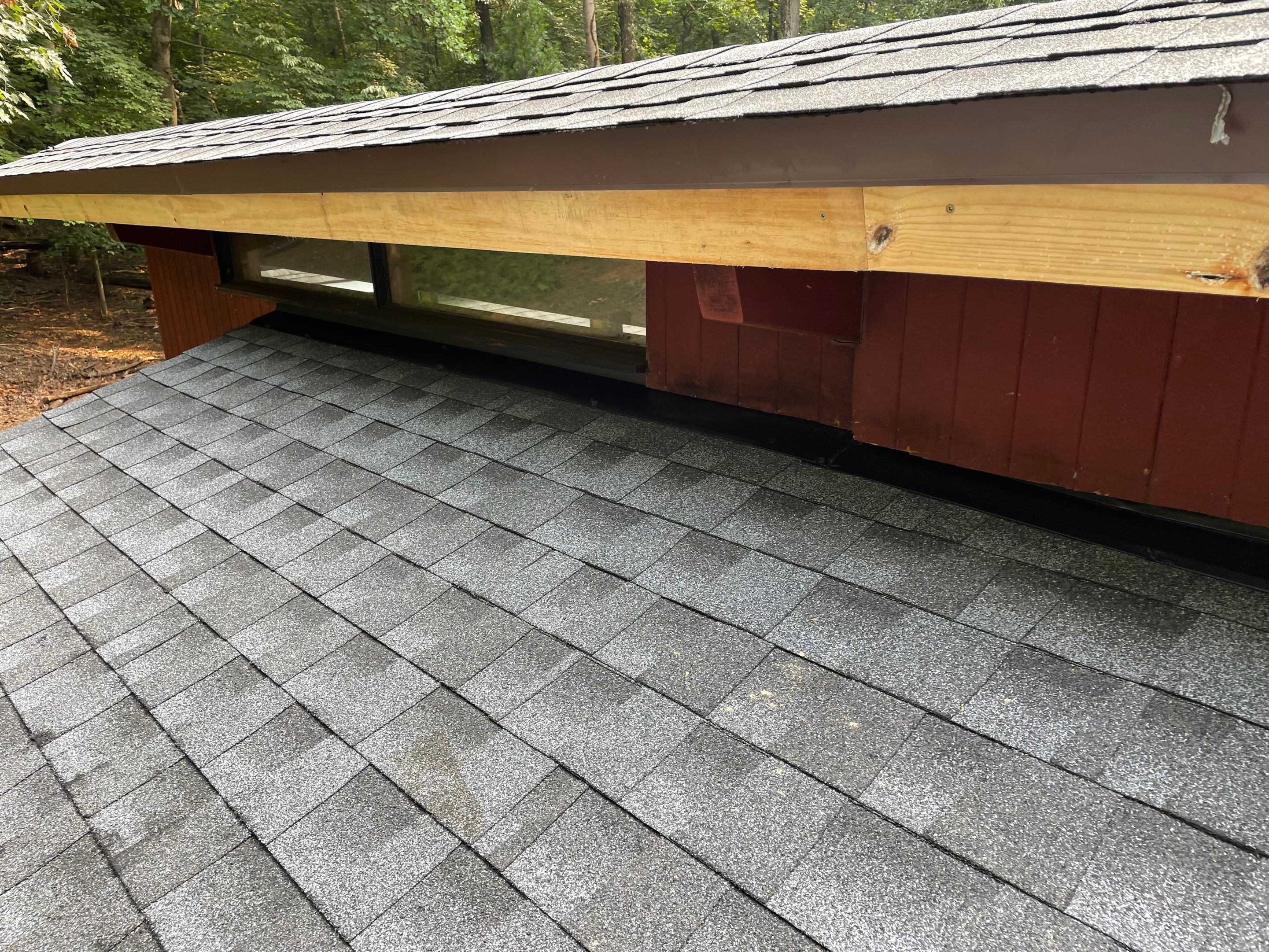 Deckhouse Roof Replacement by American Home Contractors