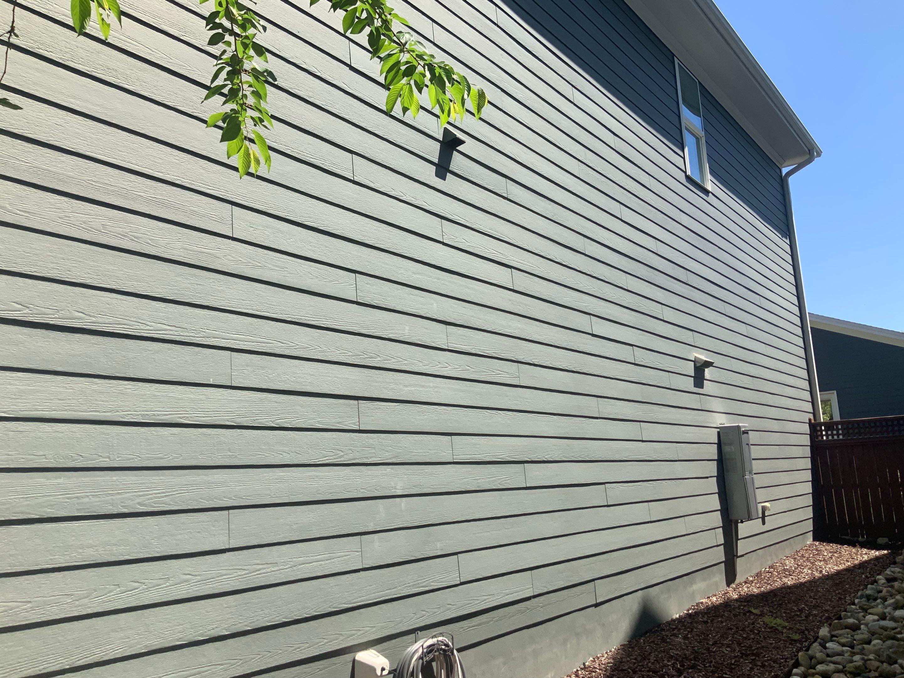 Siding replacement and exterior painting by GonzalezPainters & Contractors Inc