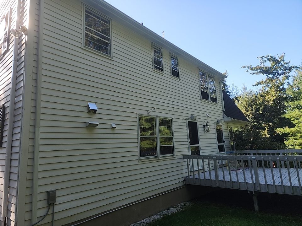 Custom window trim work and siding replacement in Dover, MA by UBrothers Construction