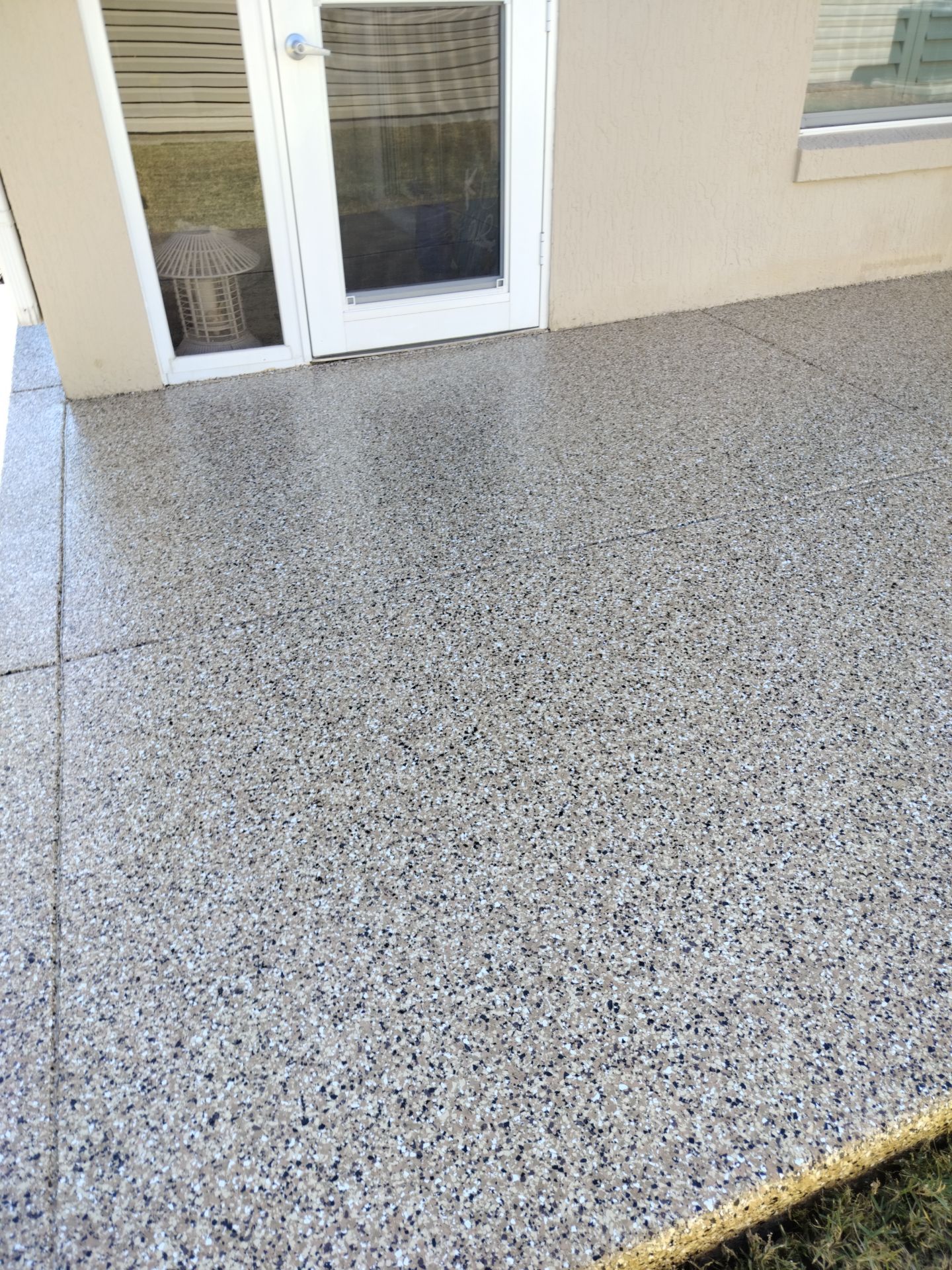 Lanai in Sandstone  by Innovative Concrete Coatings 