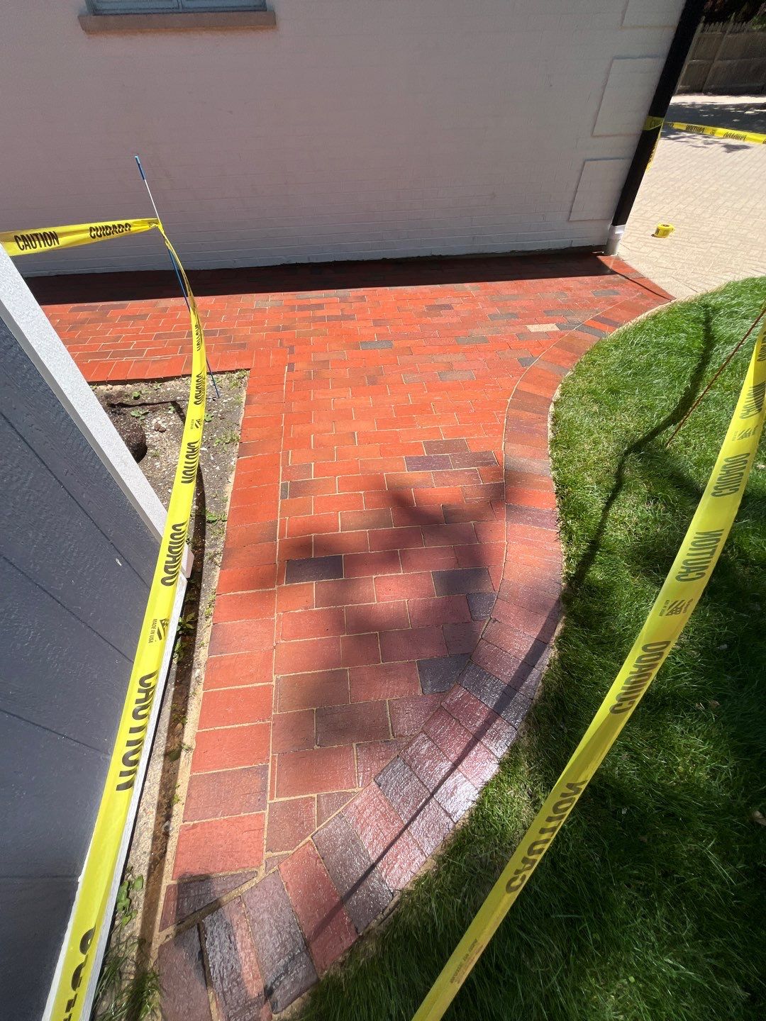 Brick paver repair, cleaning and sealing by Northern Power Washing LLC.