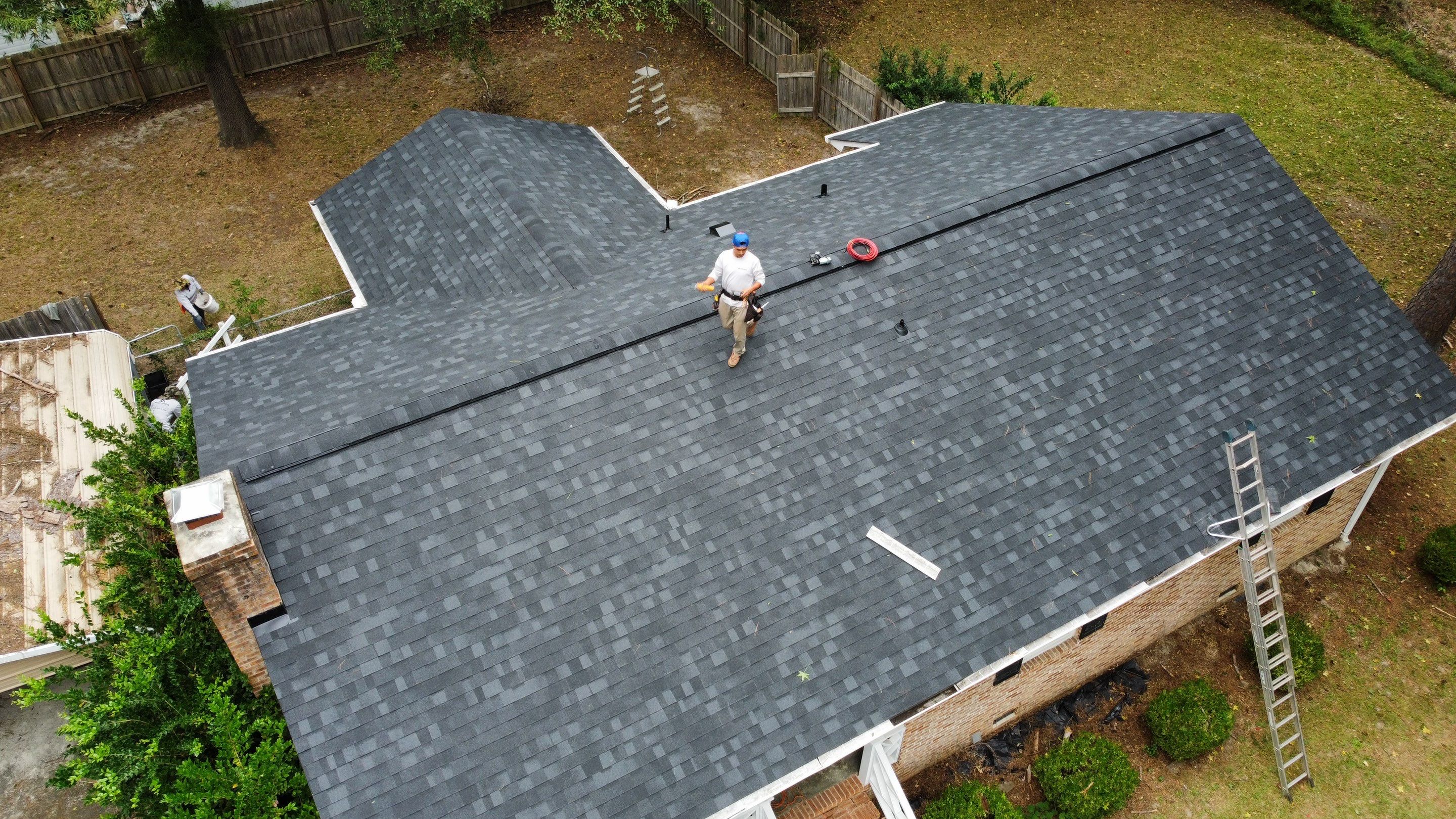 New Onyx Black Shingle Roof Replacement and Tree Damage Repair. by Midlands Roofing & Exteriors