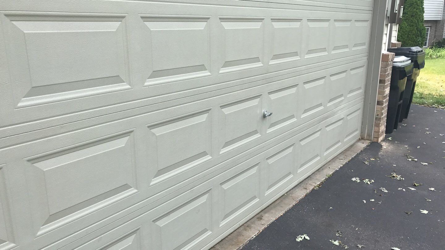 Storm Damage Restoration using Atlas Pinnacle Shingles and Mastic Vinyl Siding  by MODERN EXTERIOR SYSTEMS