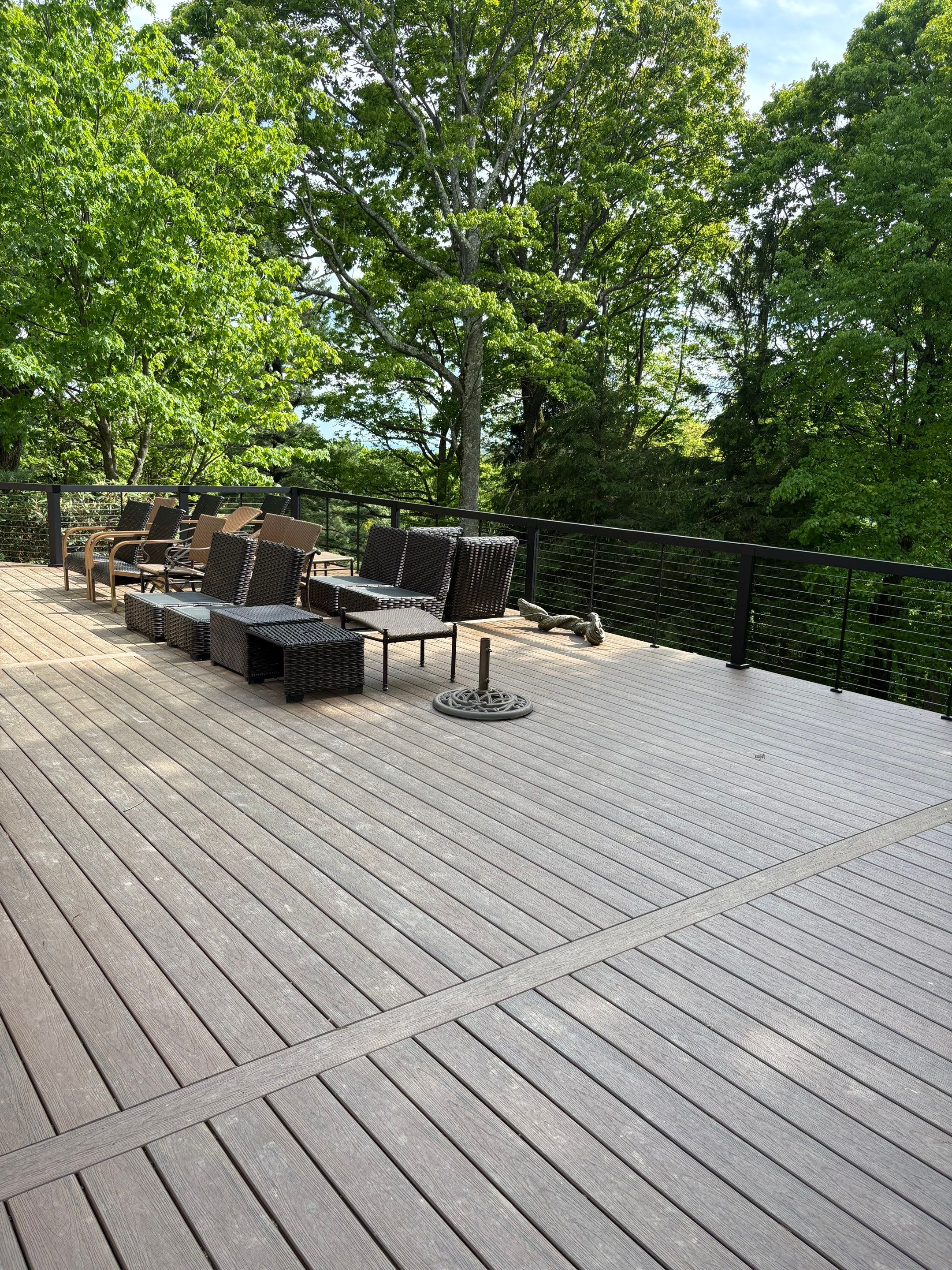 1500 sq/ft Composite Deck Build with Outdoor Kitchen in Champion by Cousins Roofing Siding & Decks