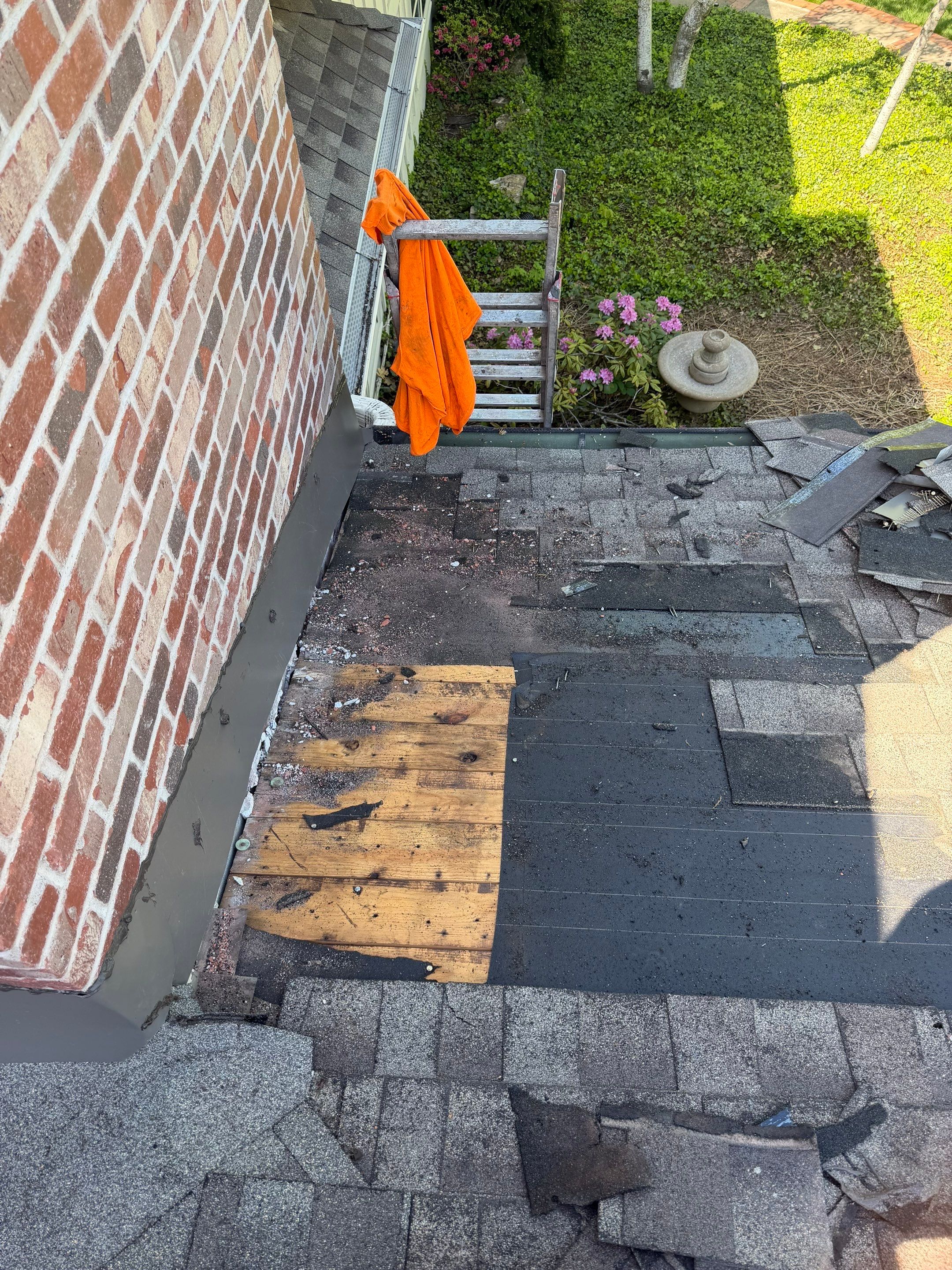 Residential Roof Replacement and Chimney Repair in Leawood by Summit Roofing
