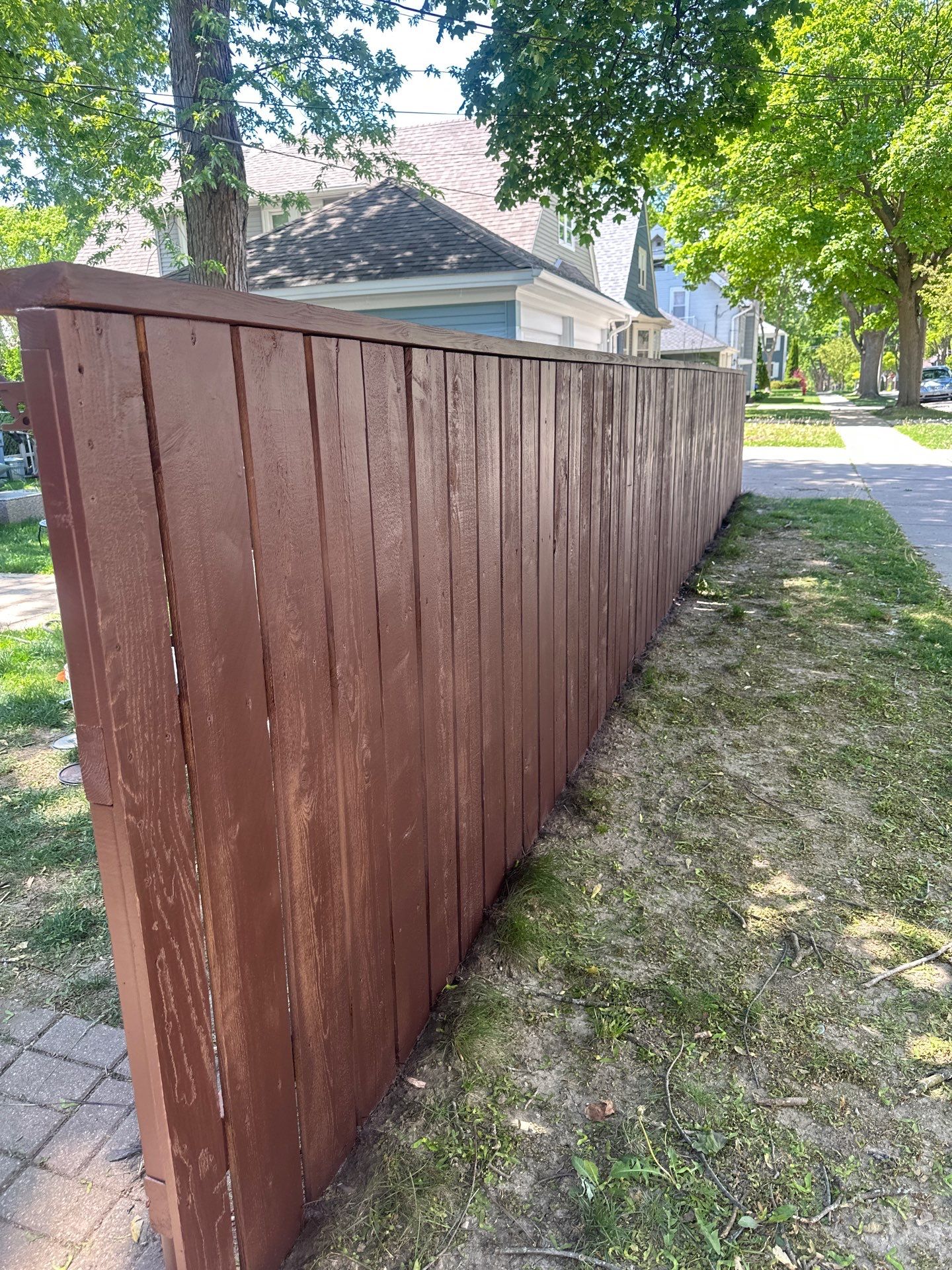 Exterior Porch Restoration and Privacy Fence Staining in Wauwatosa by OCS Contracting Services