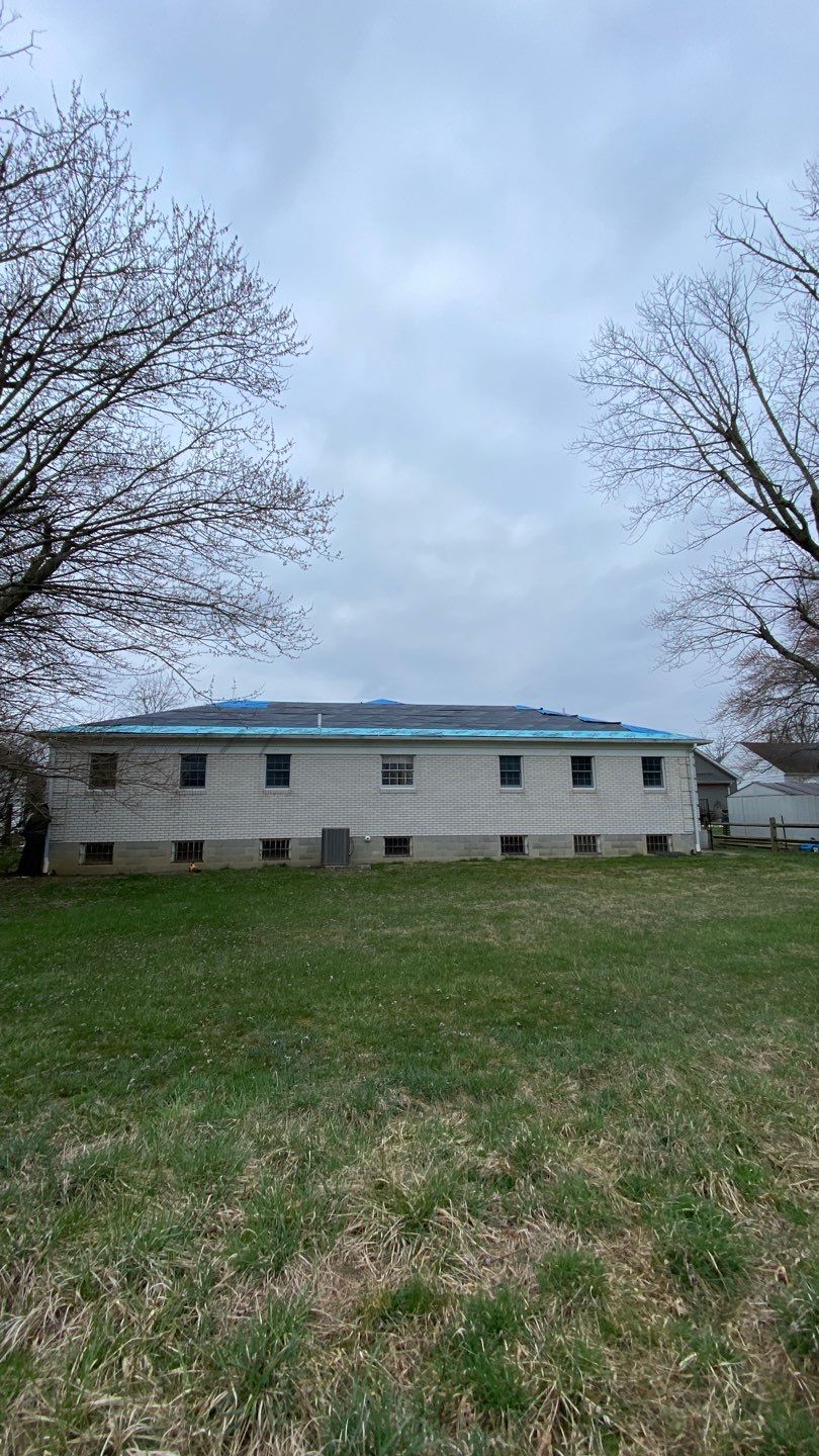 Commercial Roofing Installation using Performance Panel Metal - Frost Black by RoofX 