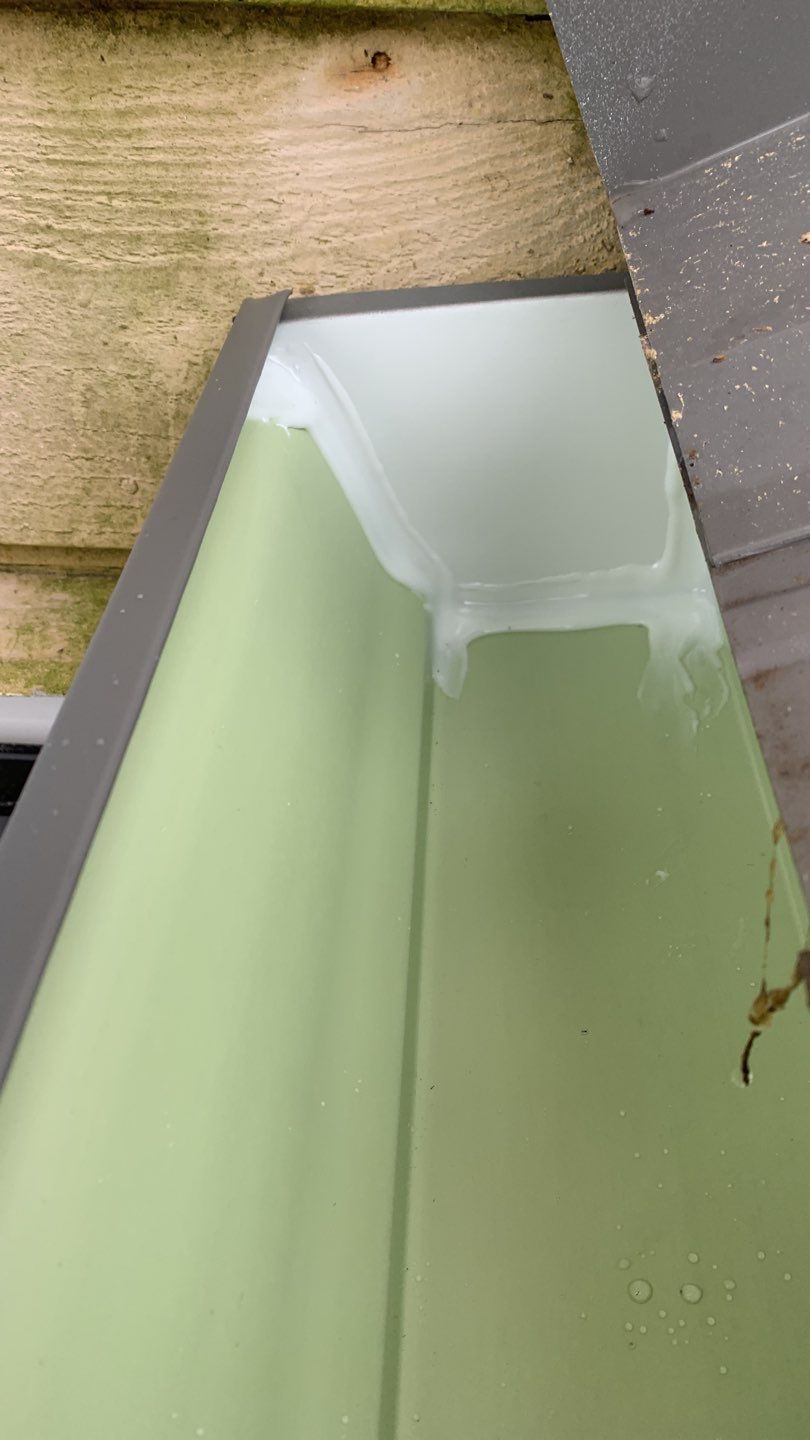 Seamless Gutter Installation using Charcoal Grey Gutters by Gutter Professors