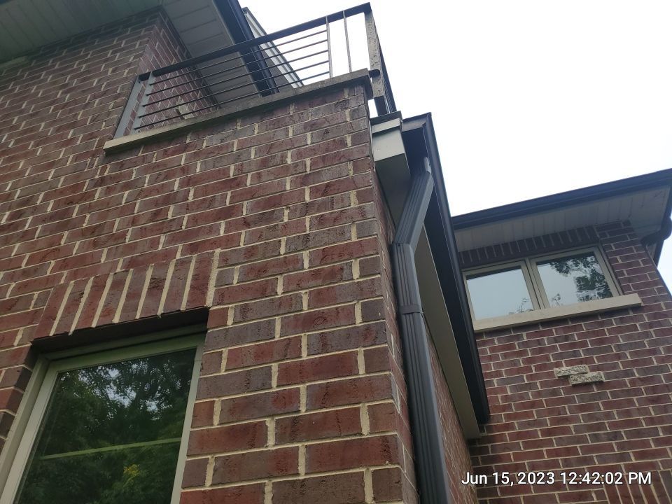 Highland Park, IL Bluestone, concrete,  Trex deck cleaning by Northern Power Washing LLC.