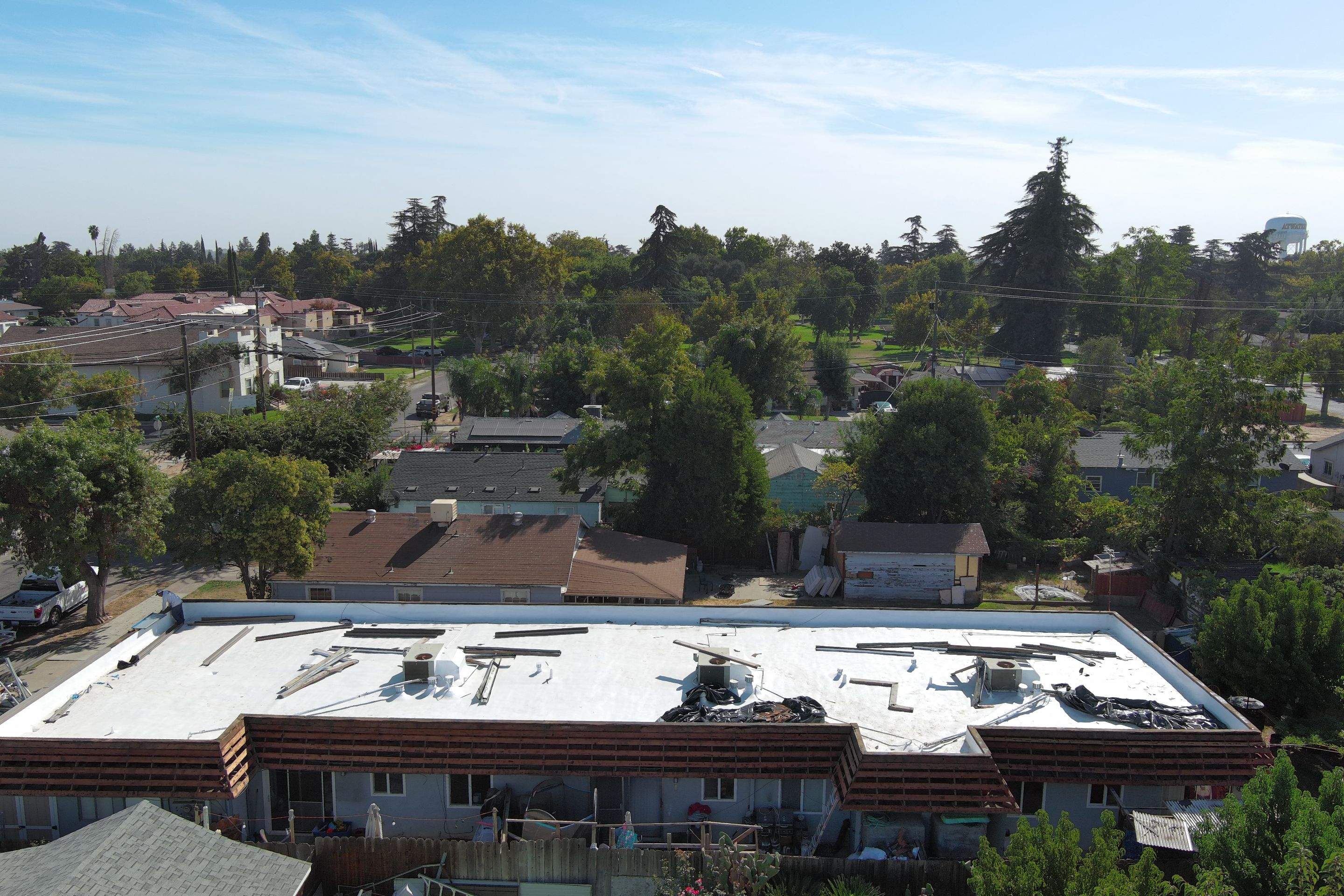 Foam Refurbish using Conklin Benchmark/PUMA XL coatings and spray foam; Also metal roofing around parapet wall by Straight Edge Roofing Inc