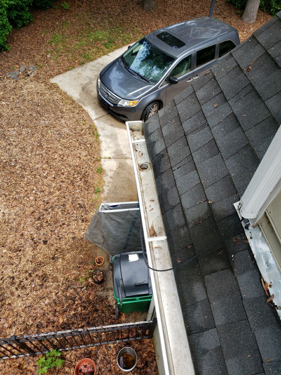 Gutter Cleaning using water by Power Wash Masters LLC