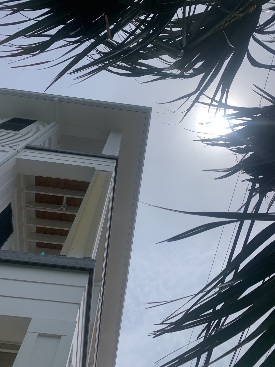 Downspout Installation for Multi-Story Building in Panama City FL by Gutter Professors