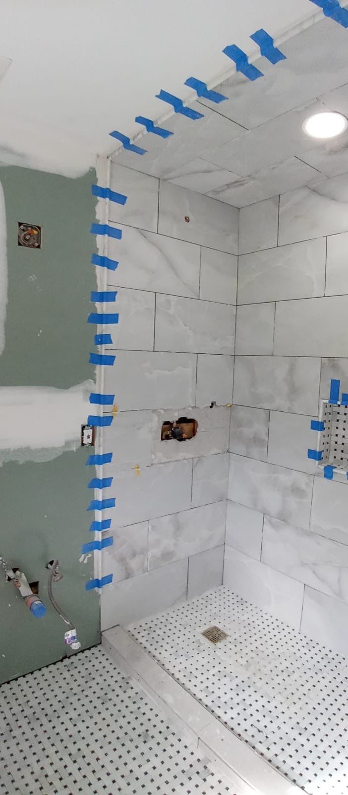 Bathroom Remodel using Tile by Home Concepts Construction
