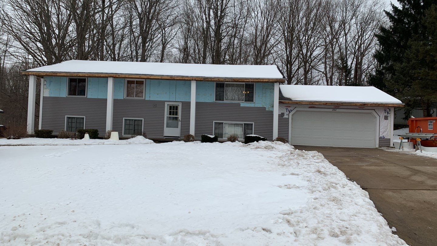Complete Siding, Roofing, and Window Replacement by Acme Exteriors