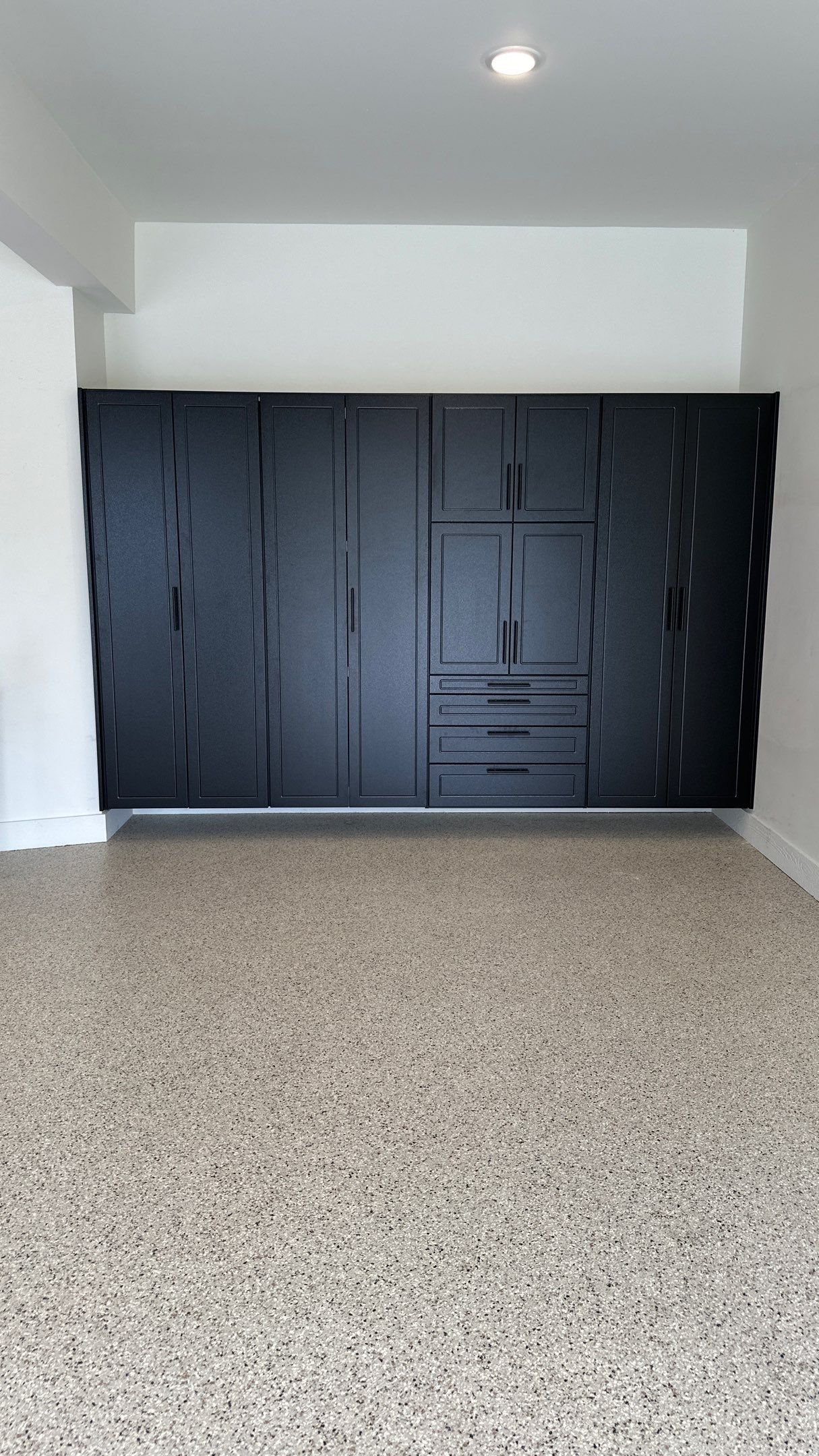 Jed W. went with Black powder coat on his cabinets.  by Banner Garage