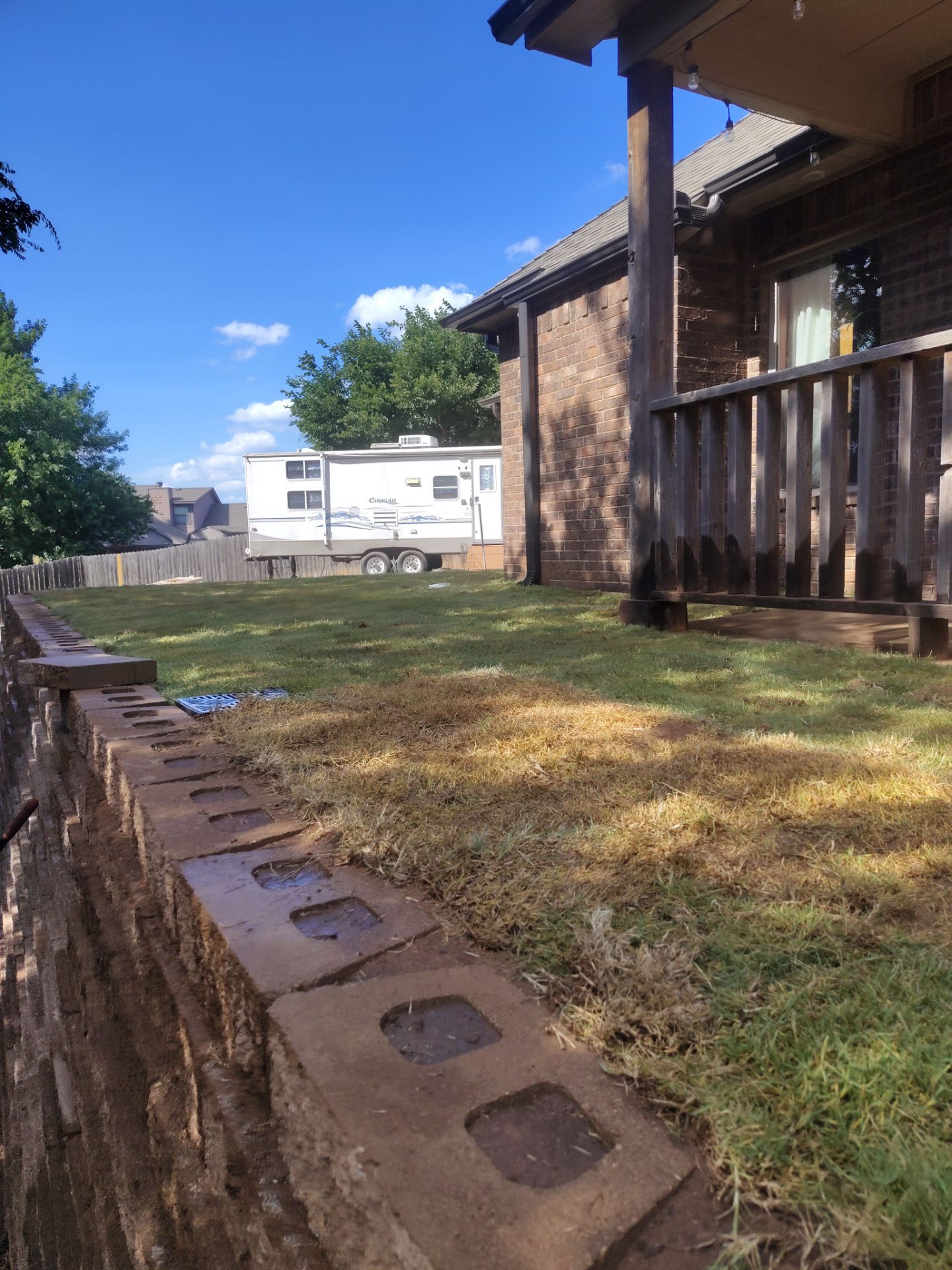 Custom Segmental Block Retaining Wall and Sod Installation in Lawton by Clays Services Inc