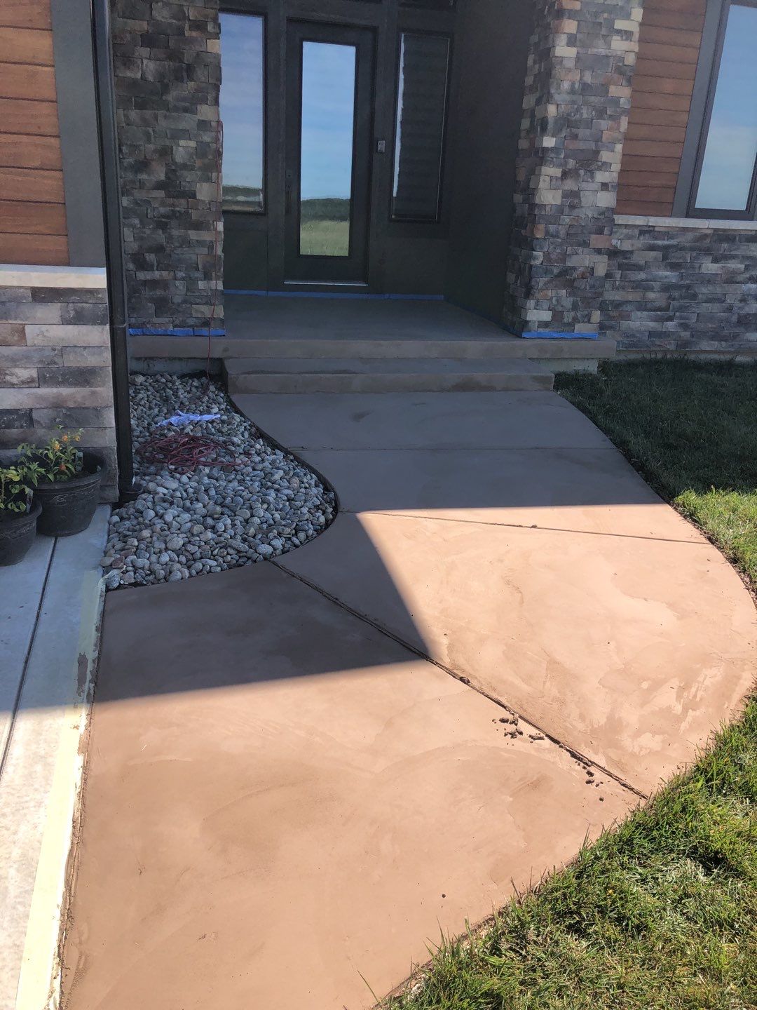 Olathe, KS -- Stoop/Sidewalk Tuscan Overlay by Big Red Decorative Concrete, LLC