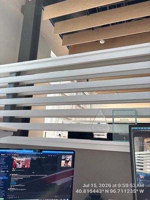 Modern Office Remodel with Wood Ceiling Baffles in Lincoln
