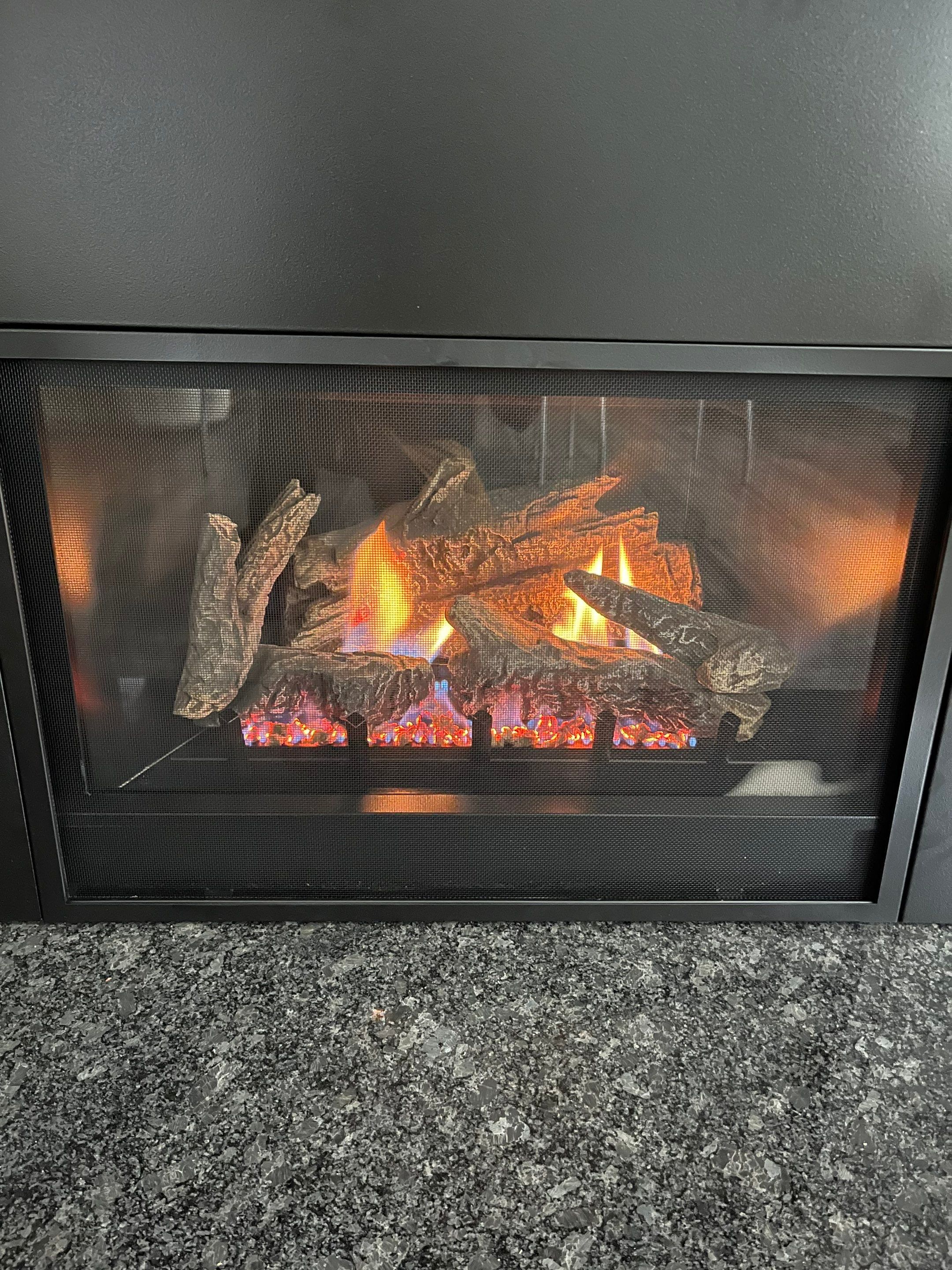 Gas Fireplace Insert in Portsmouth by Premier Chimney and Roofing