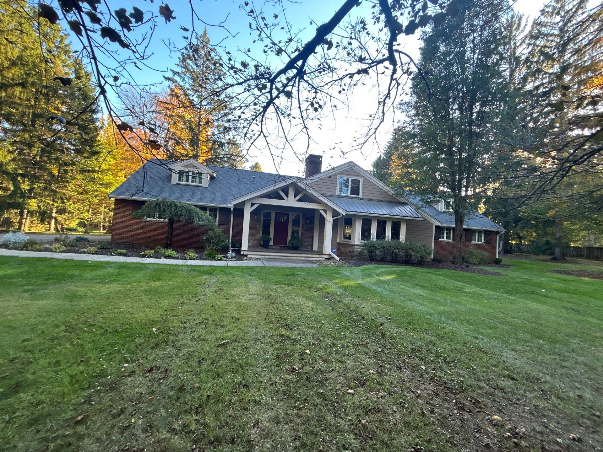 Moreland Hills Roof + Gutters Replacement by Atlas Roofing & Restoration